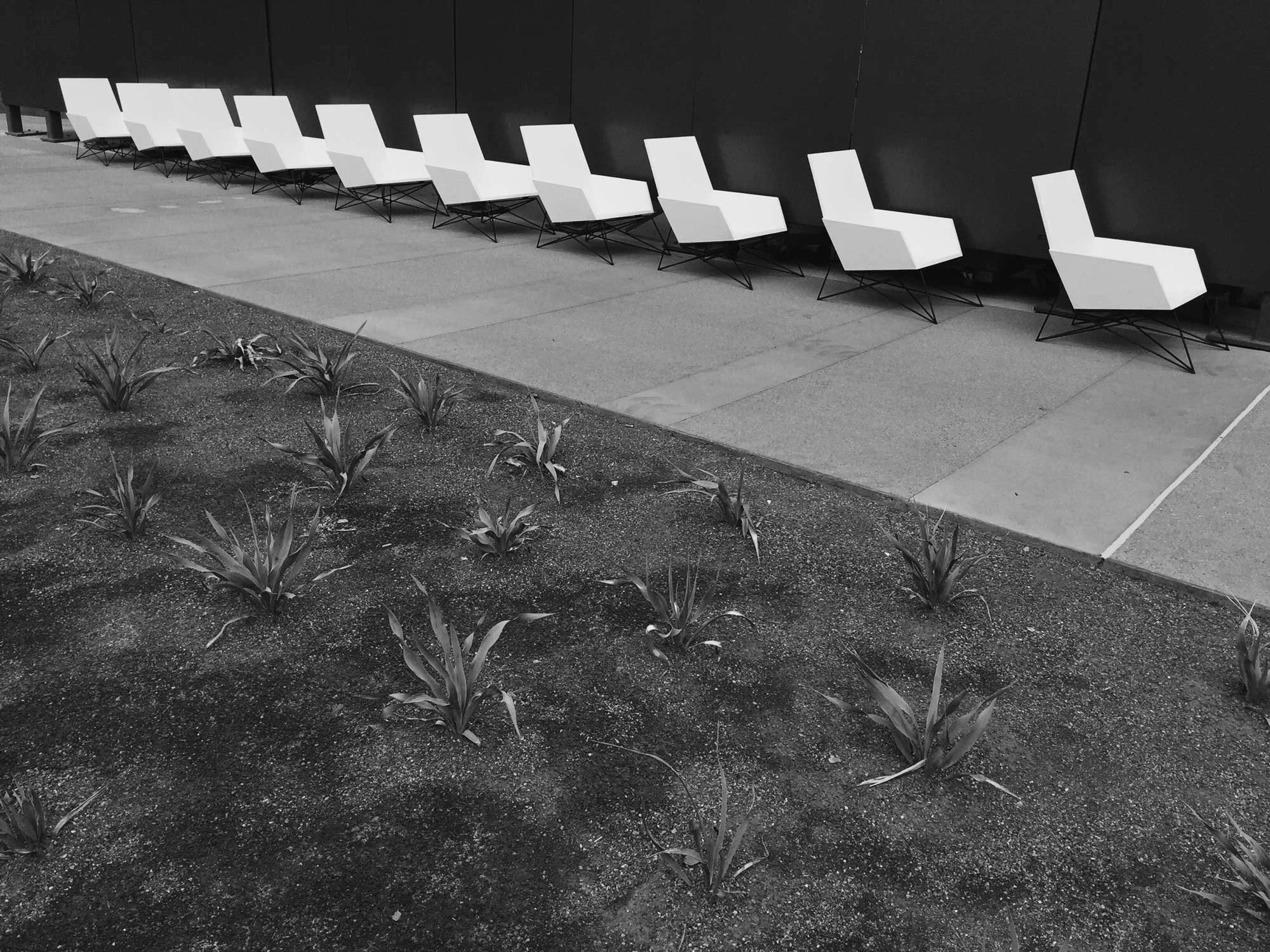 Architectural outdoor concrete chairs crafted for ASU Law rooftop patio.