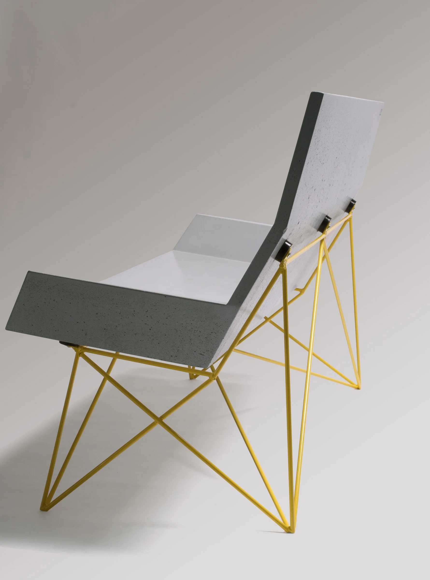 GFRC concrete seating shell on handcrafted steel rod base