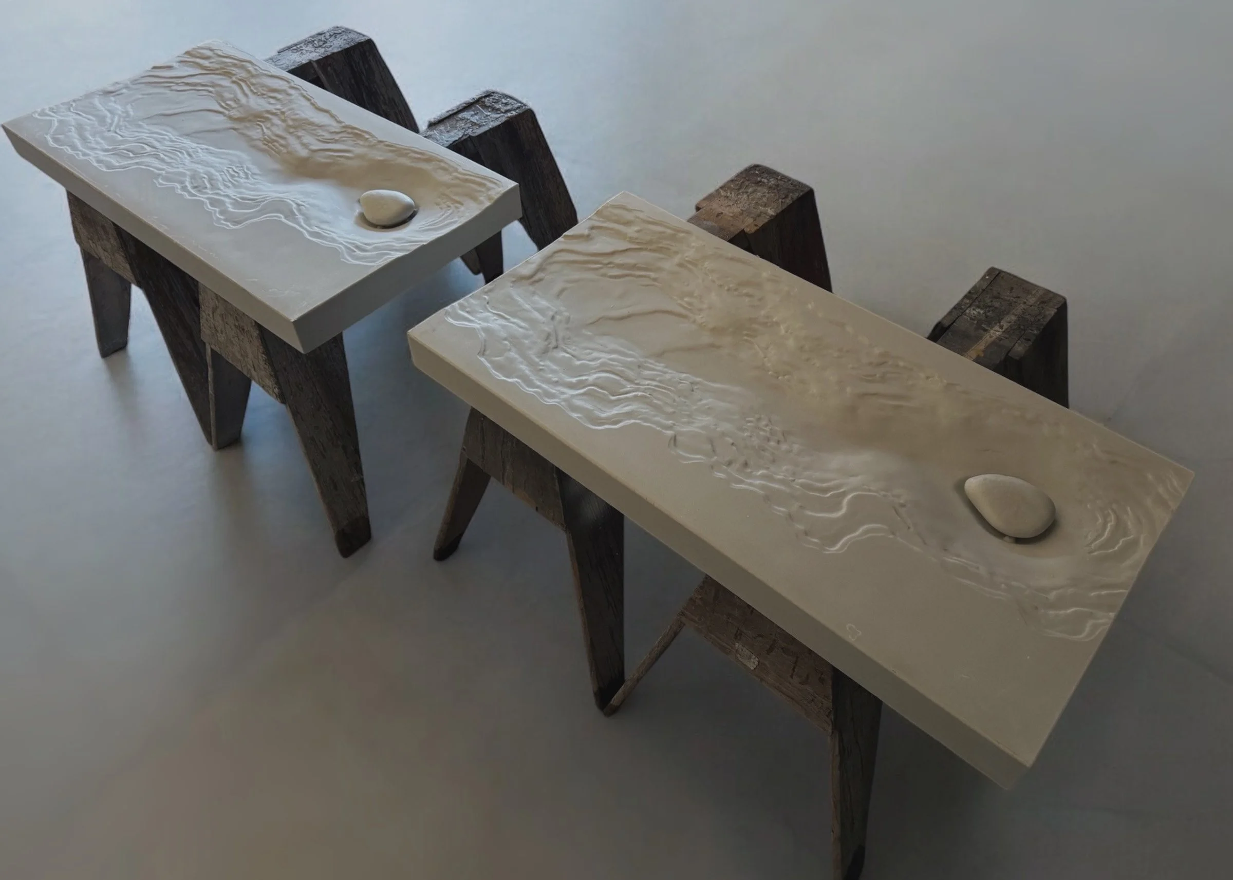 Sculptural concrete sink with hidden drain design for modern bathroom spaces.