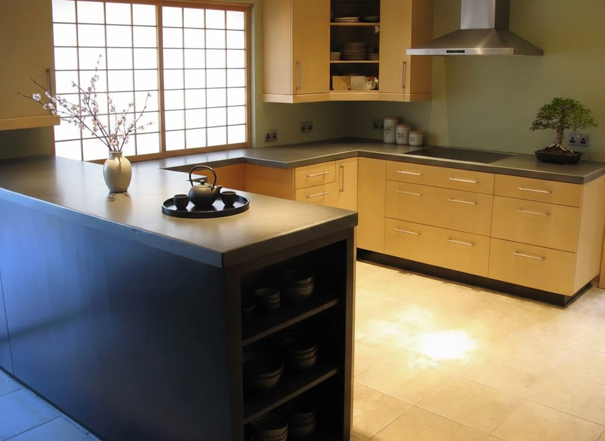 Custom concrete kitchen countertops made for an architect’s home. Simple, modern, and handcrafted with healthy finishes for timeless design.