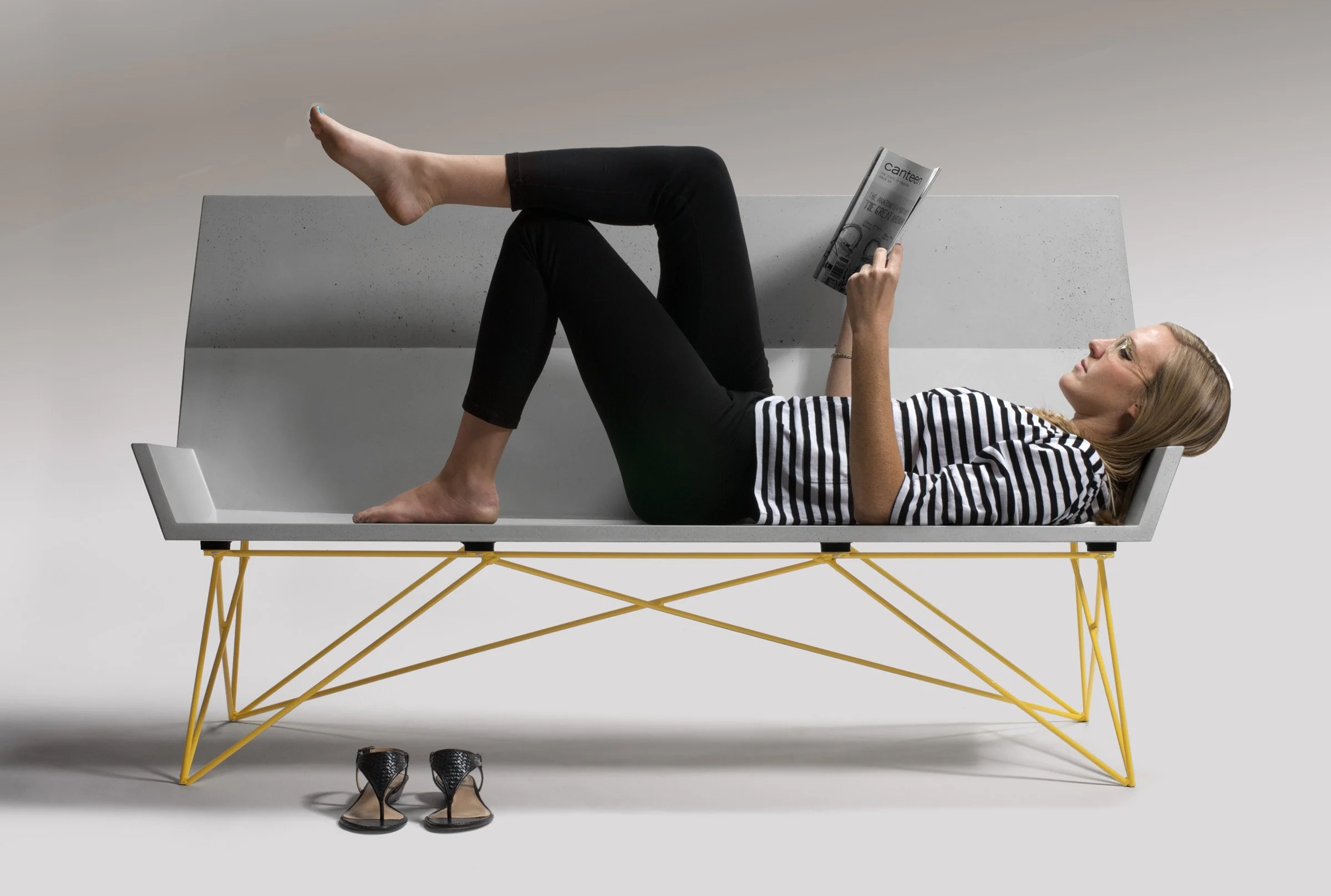 Custom GFRC concrete bench with powder-coated steel base