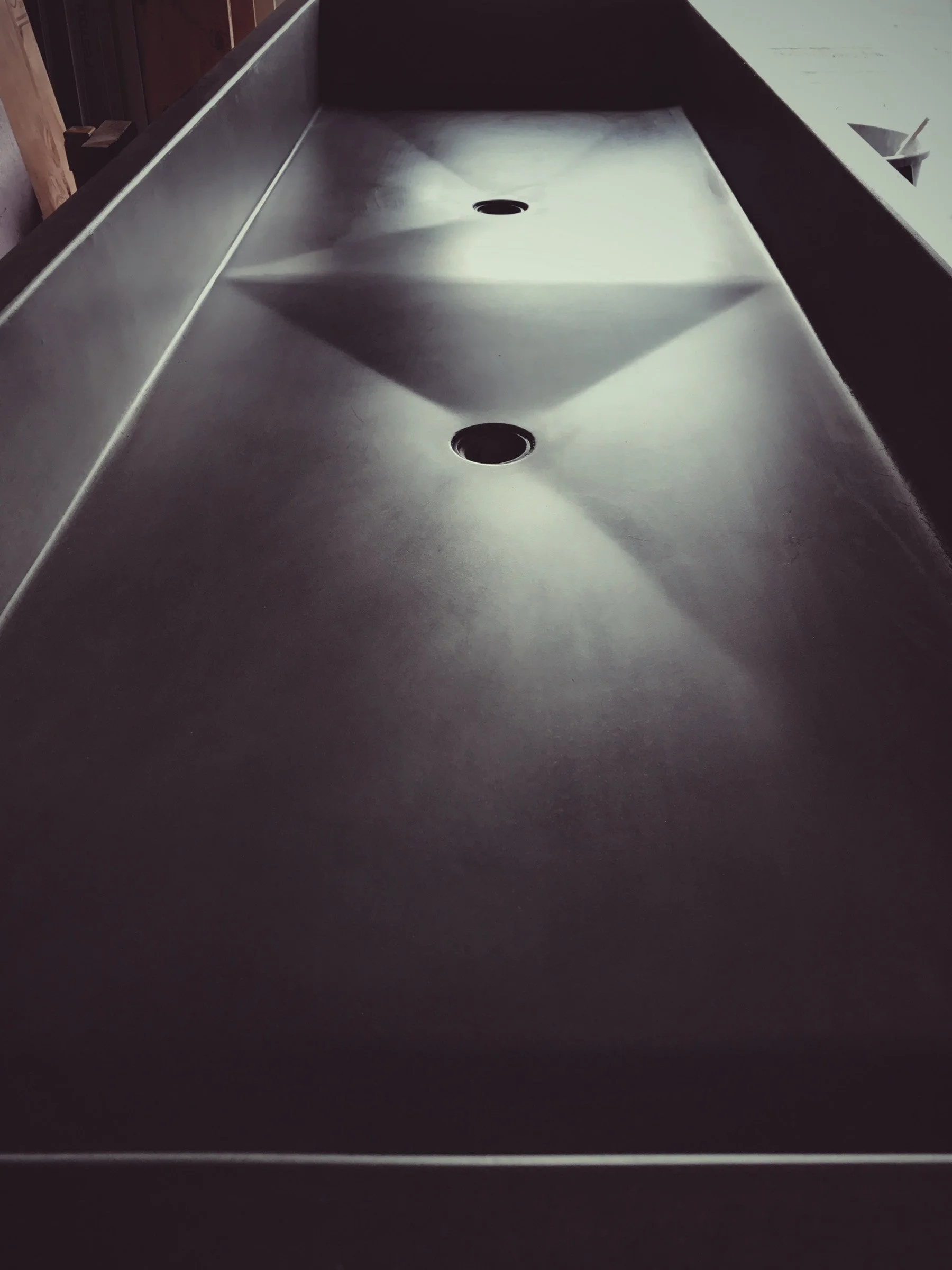 Handcrafted GFRC concrete sink designed for Caribbean residential project.