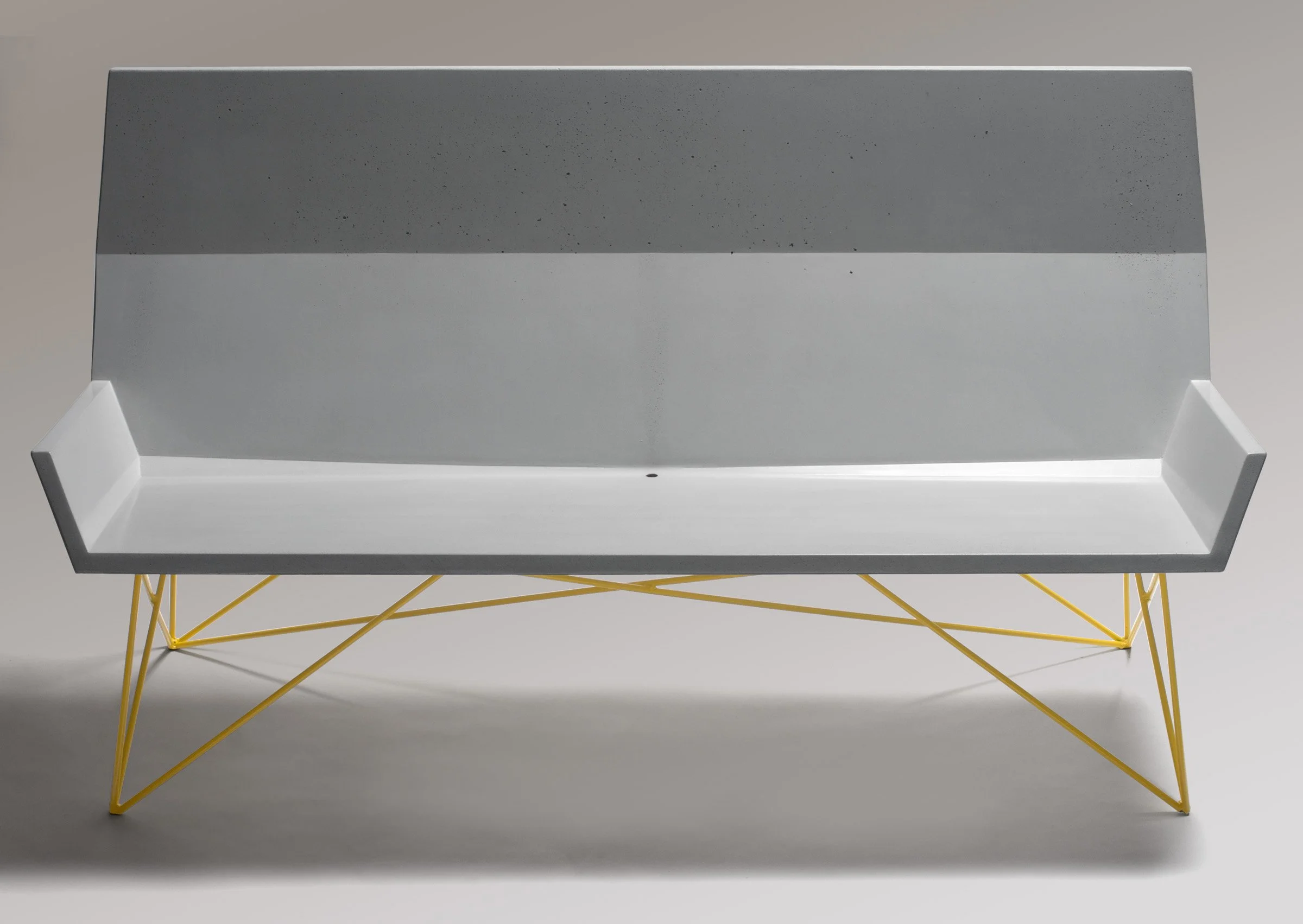 Handcrafted GFRC concrete and steel bench that launched the Hard Goods collection. Mid-century inspired design with copper drain detail for outdoor use.