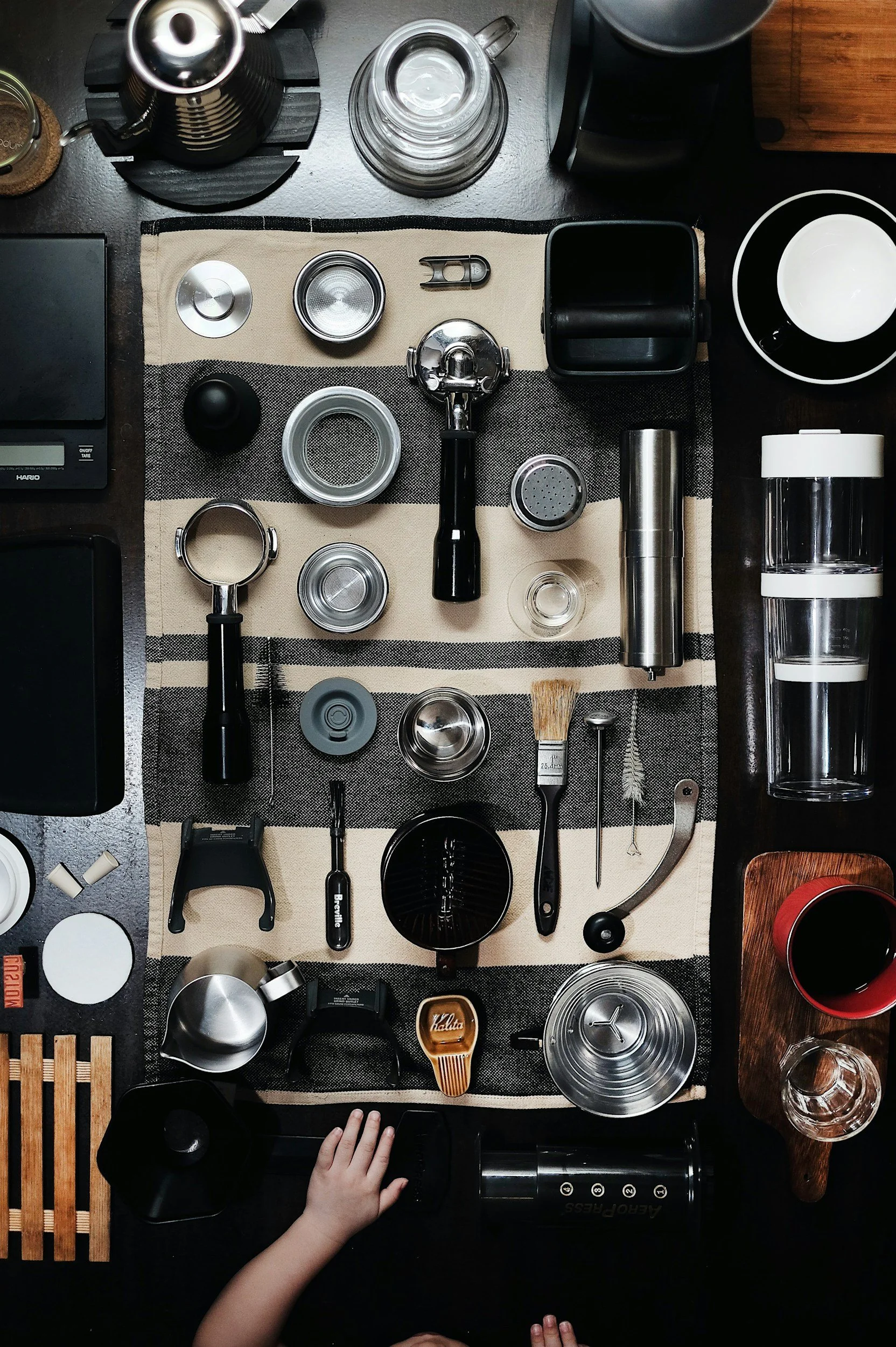 Top-down view of various coffee-making tools and equipment arranged for a coffee catering event in Omaha, NE.