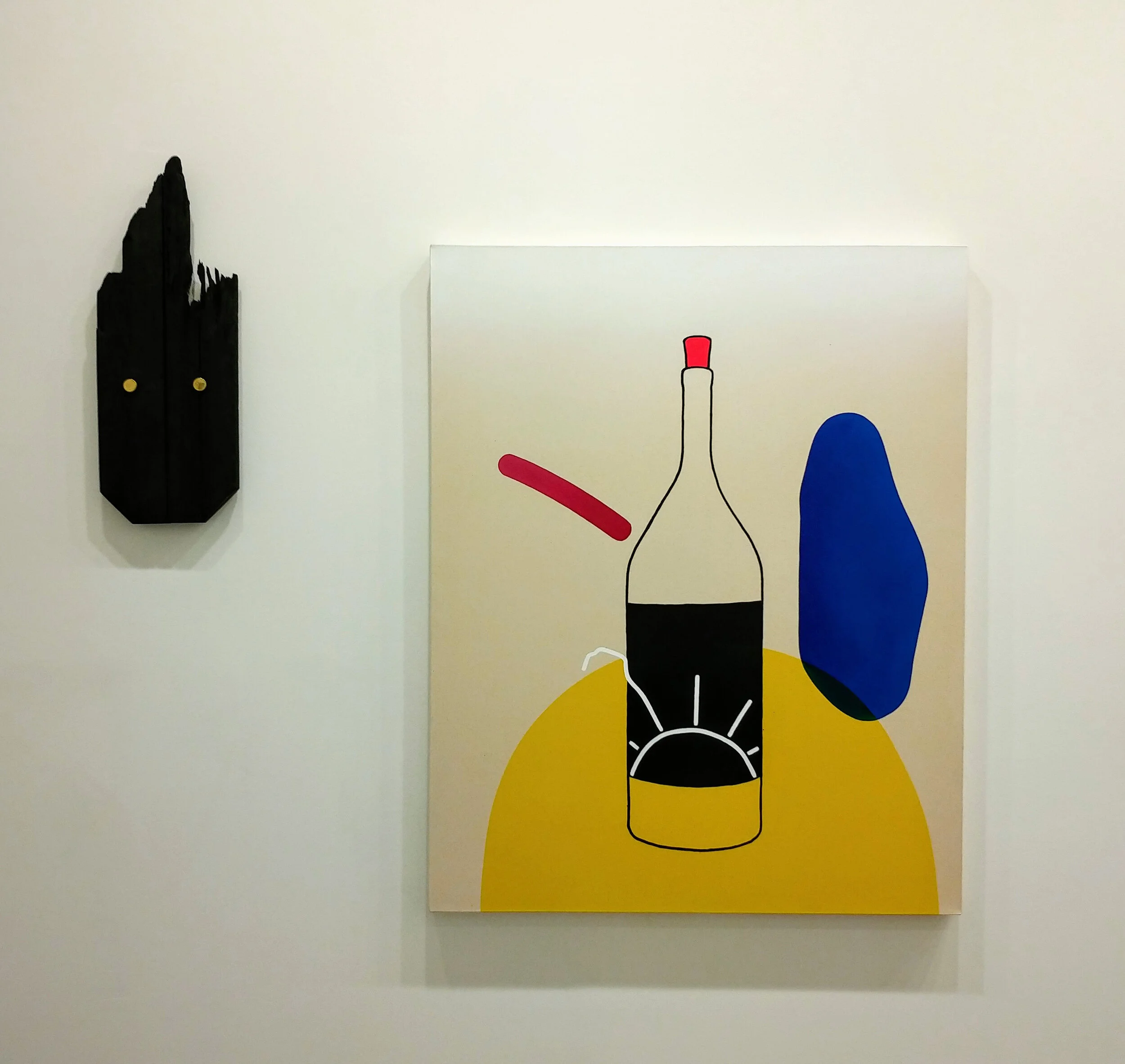 Bottle with pink cork and mask