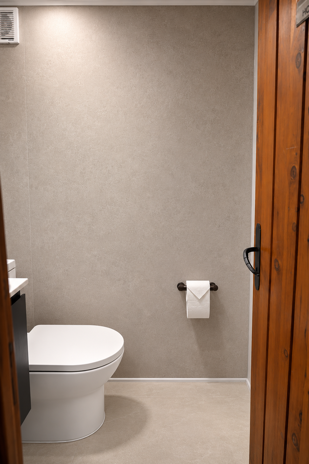 Baño colegio Newland remodelado