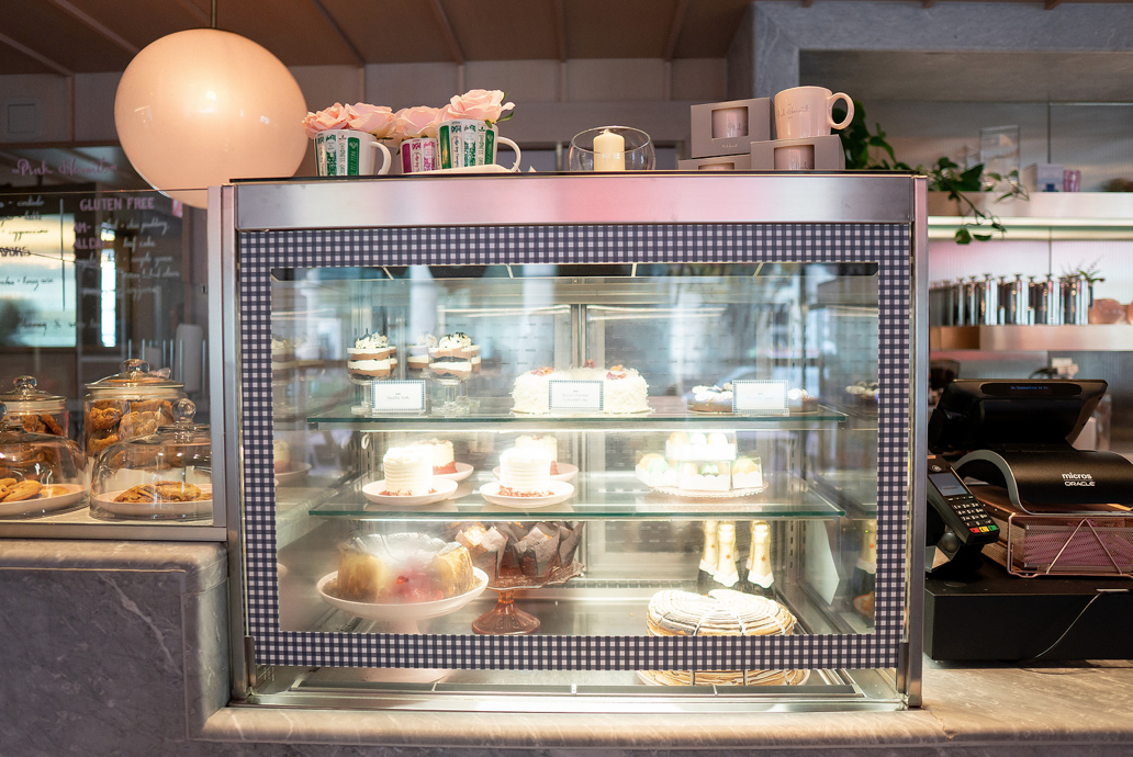 A touch of Draper on the pastry case: navy gingham custom window vinyl