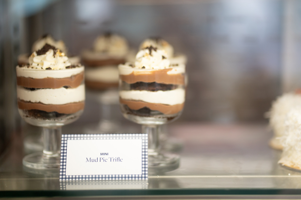 Tent cards placed in the pastry case, and on trays of passed hors d'oeuvres