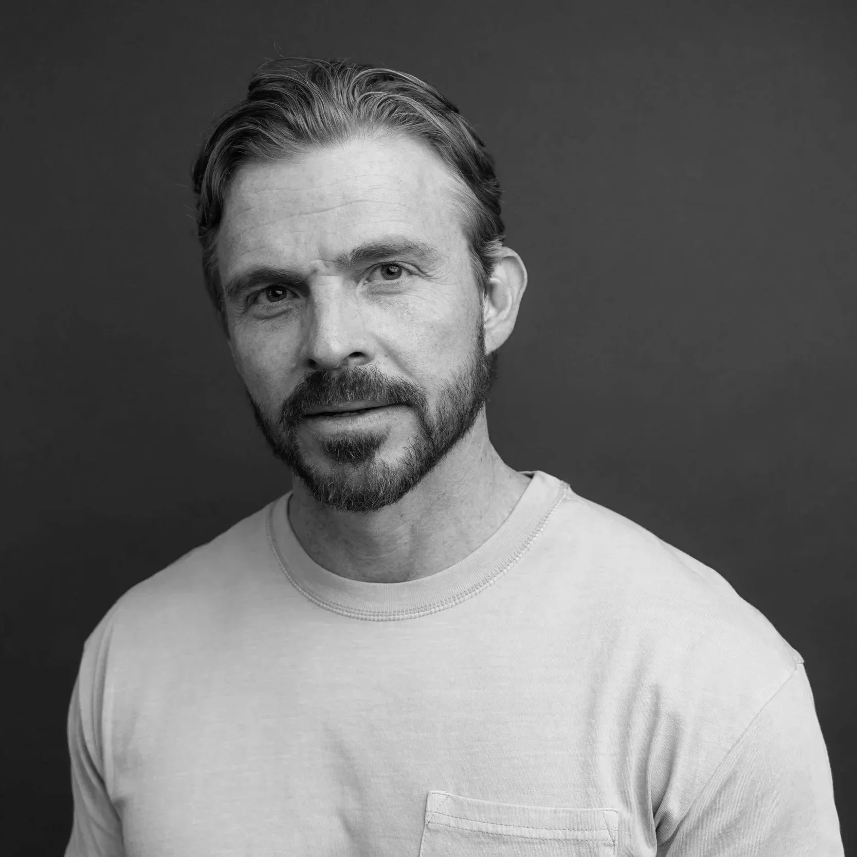 Black and white portrait of John Foss