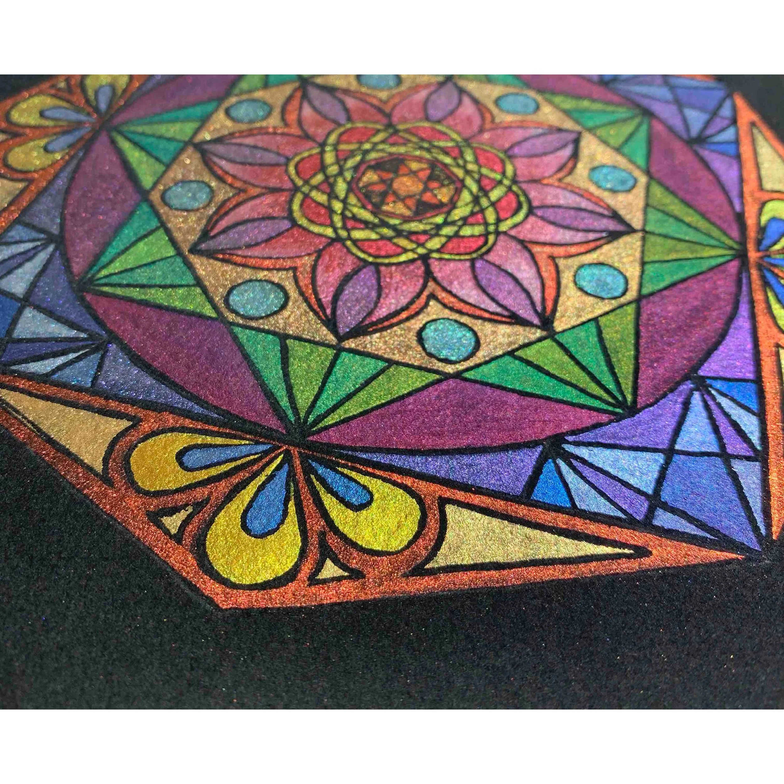 metallic macro of glittery mandala