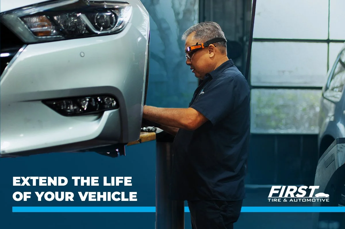 A First Tire & Automotive technician investigates a car tire
