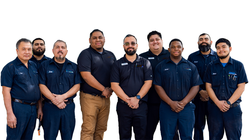 Group of nine men wearing blue uniforms standing together.