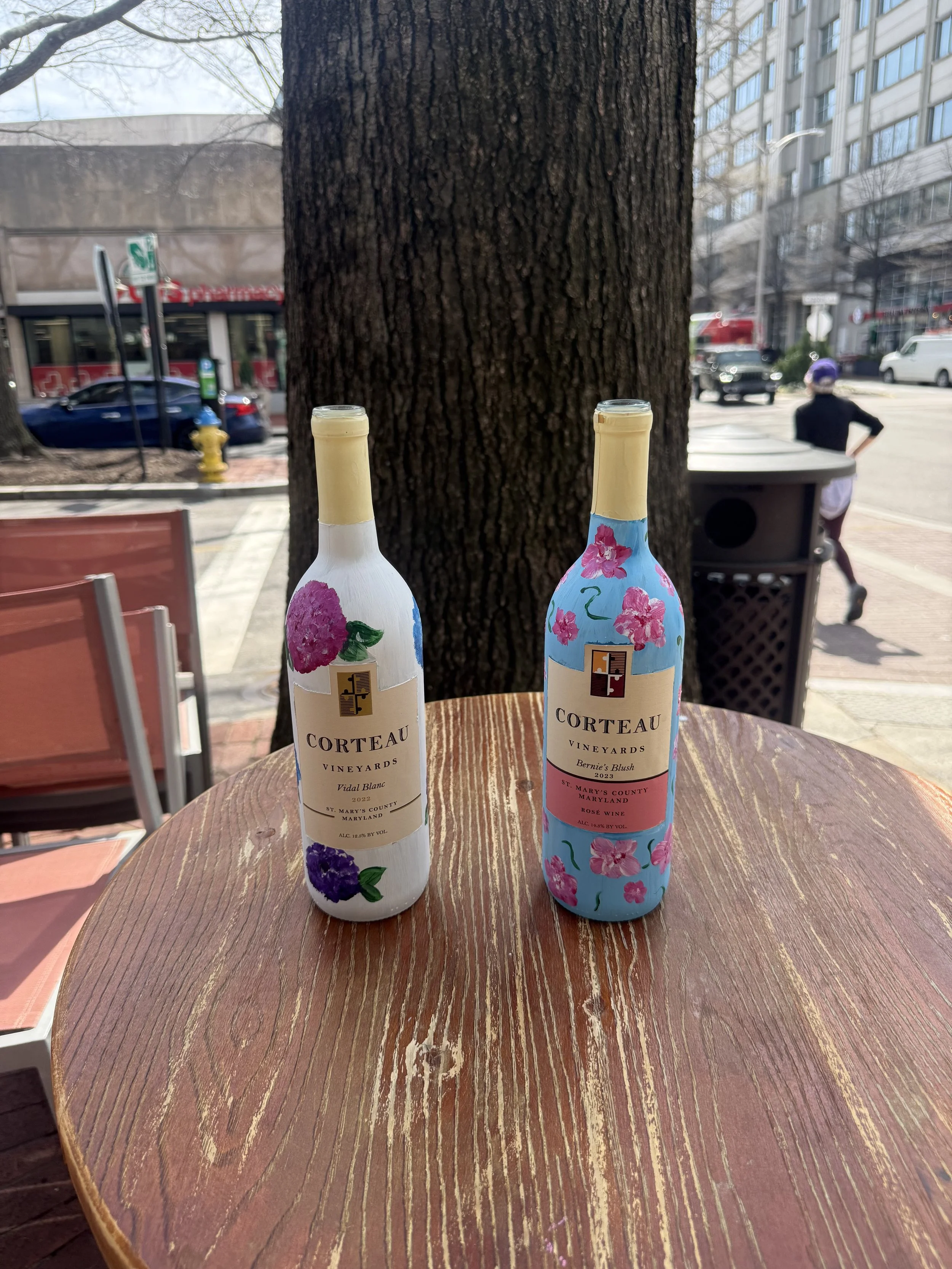 Red Apron painted wine bottles