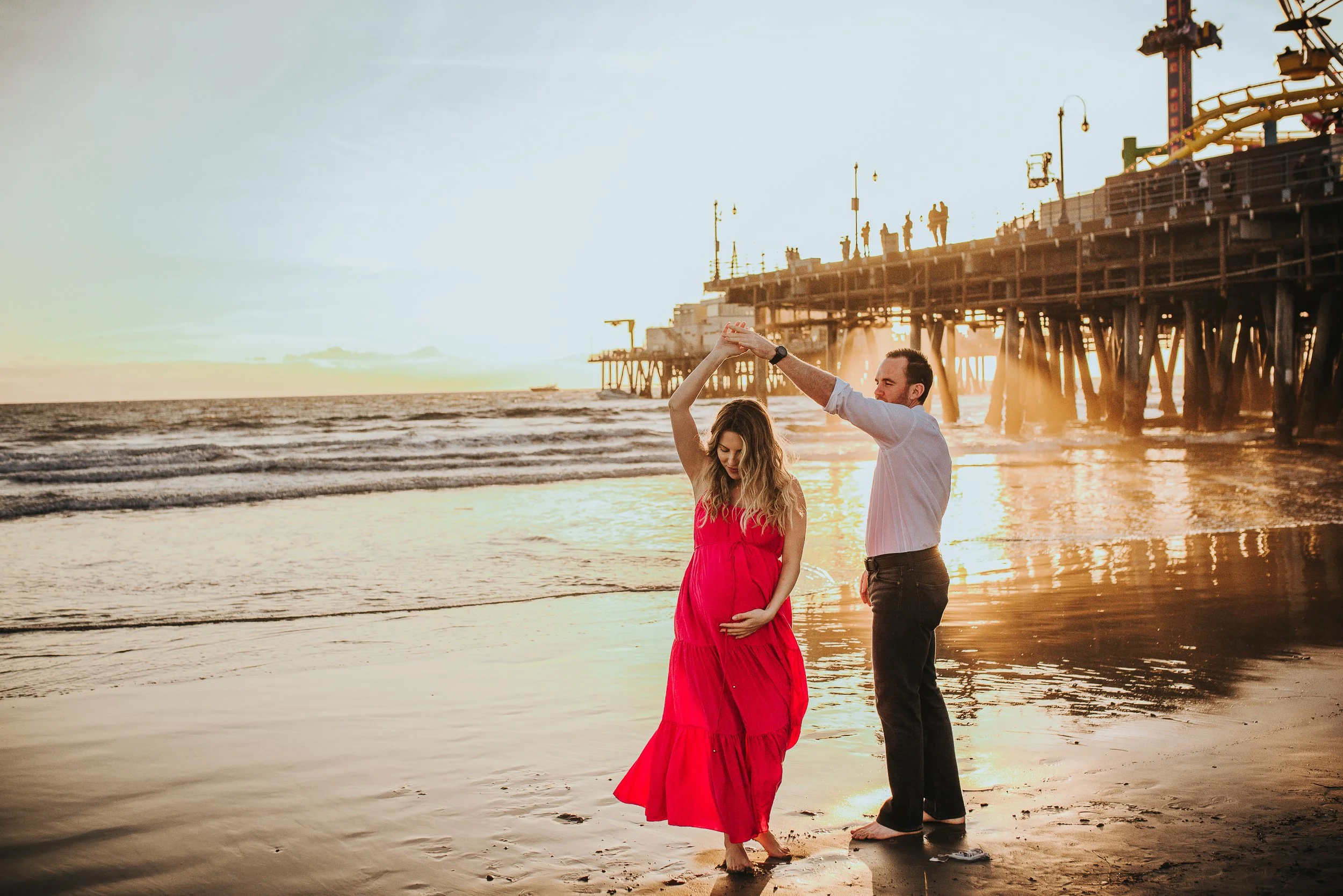 Dancing_Santa_monica_pier_maternity_sunset