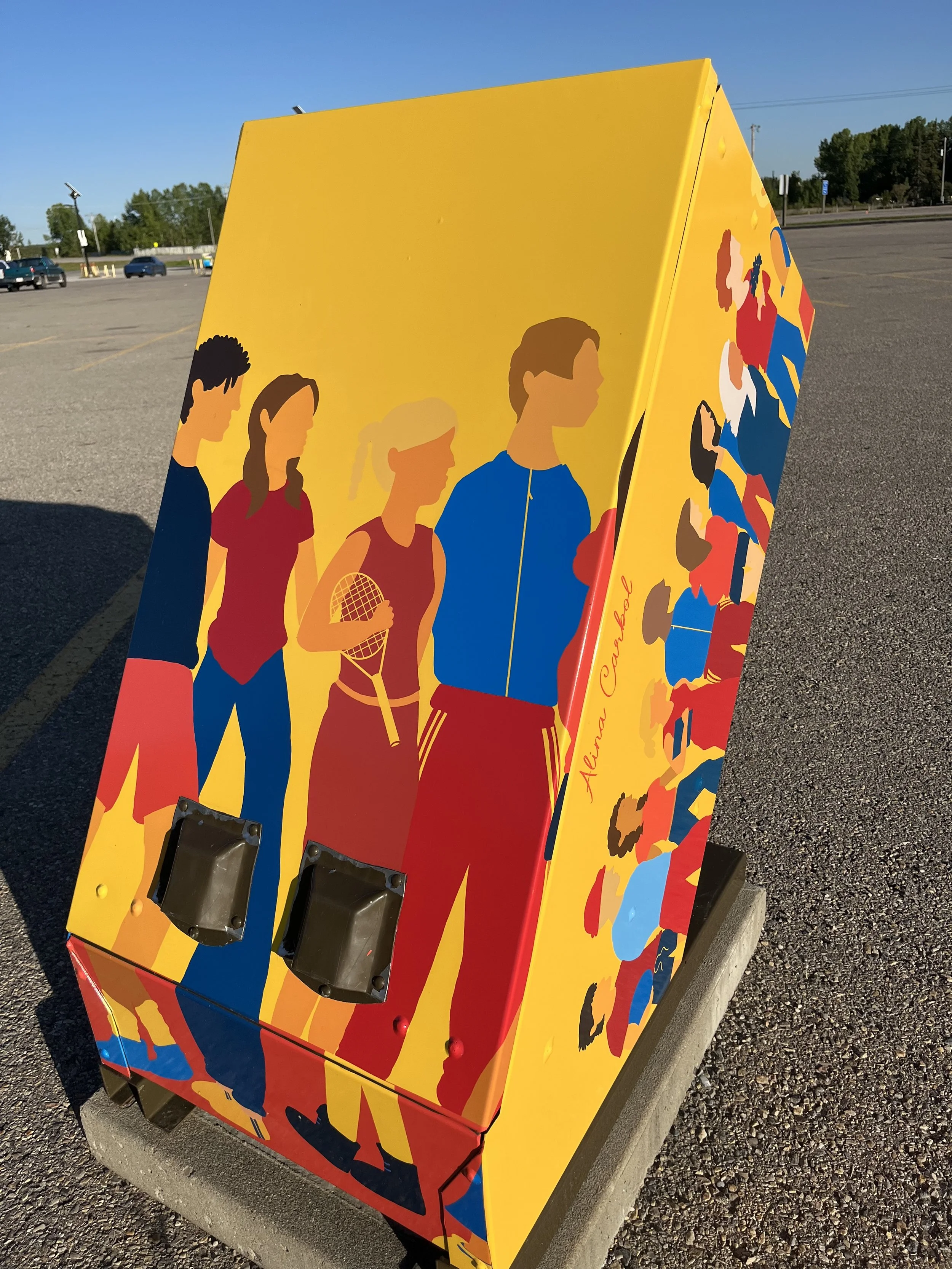 Colorful pinball machine side with illustrations of children playing various sports, including tennis, depicted in bright colors.