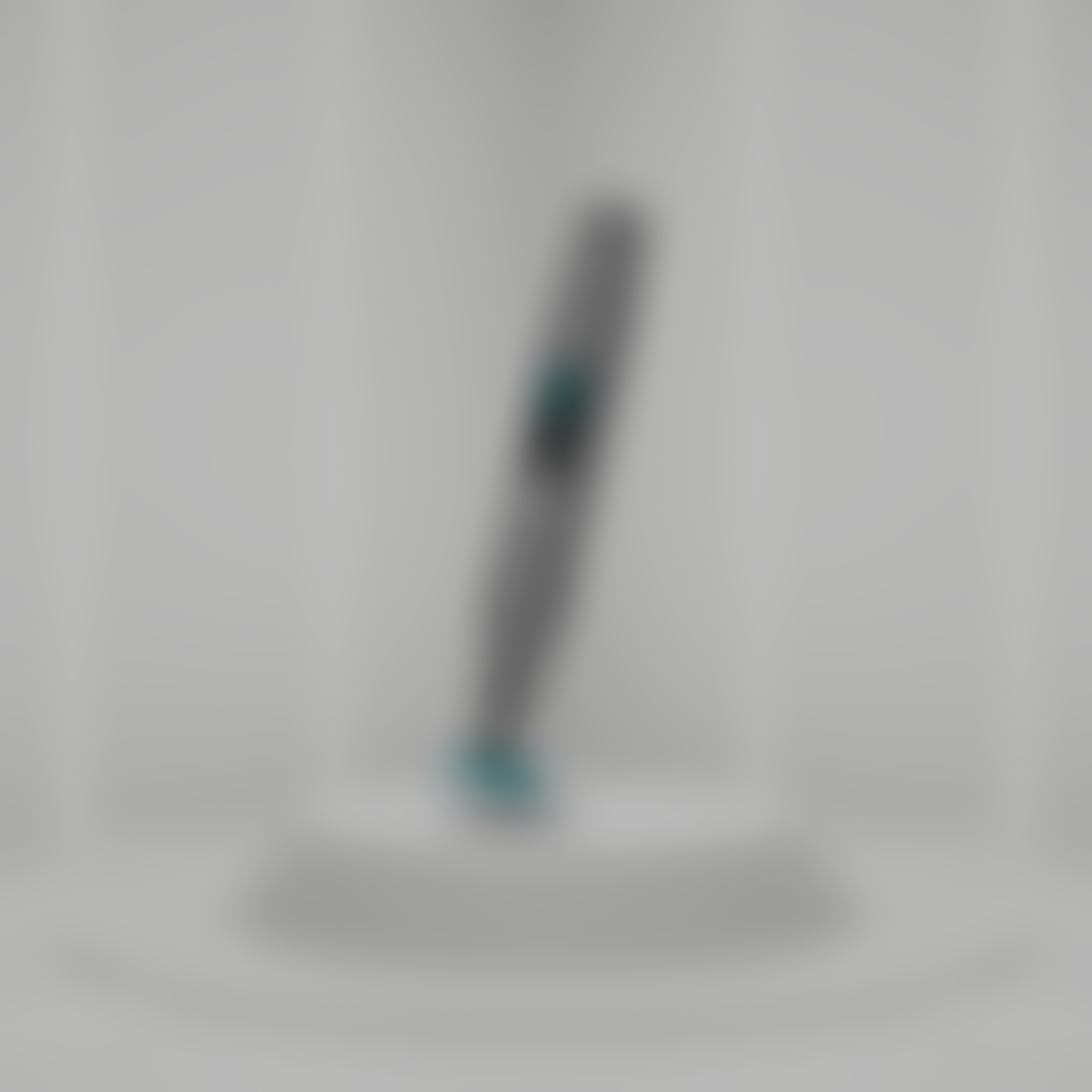 Microchanneling device used for collagen induction therapy similar to micro needling, its blurry and on a white background, upright on a small platform.