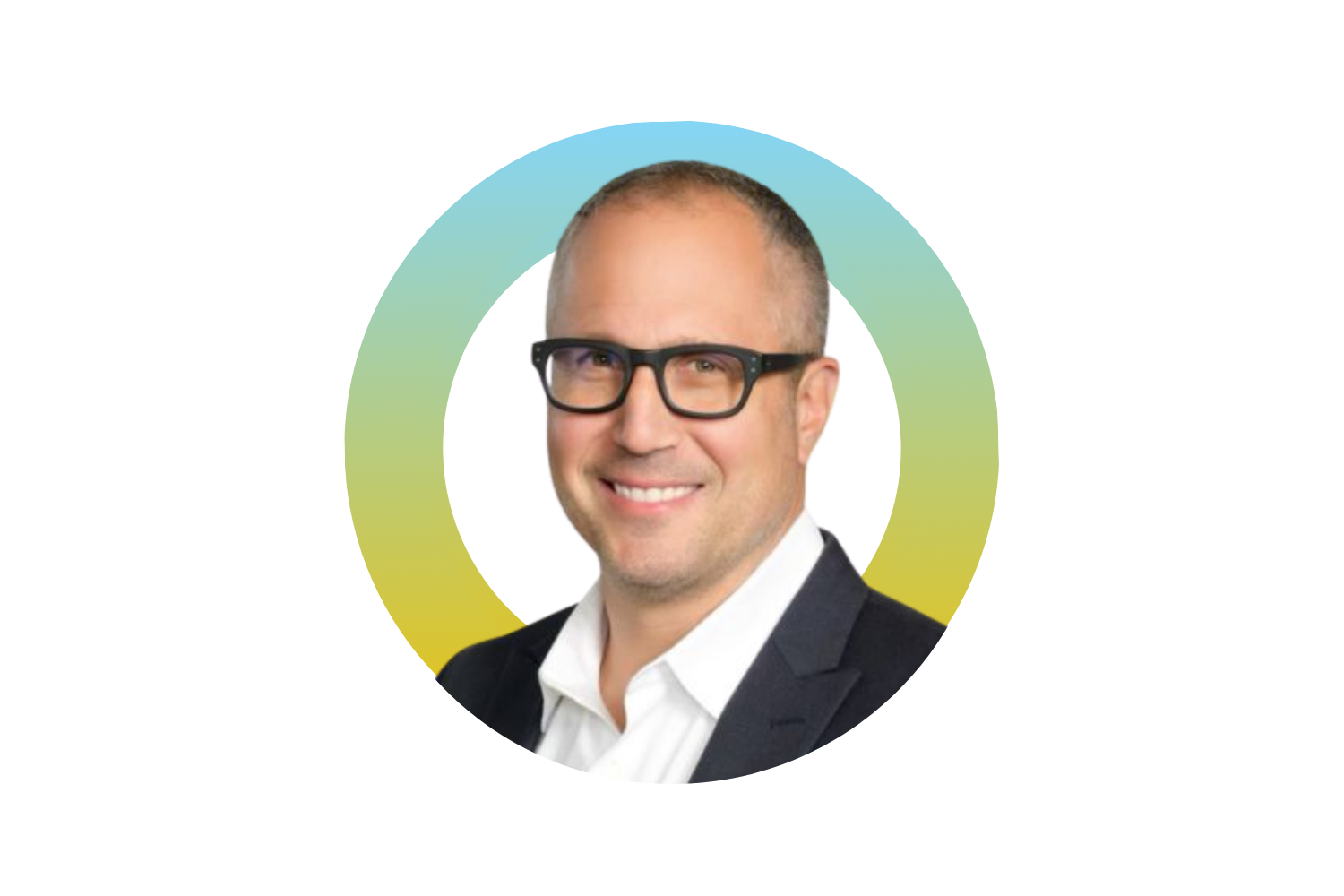 Portrait of a smiling man with glasses in a dark suit and white shirt, with a colorful background.