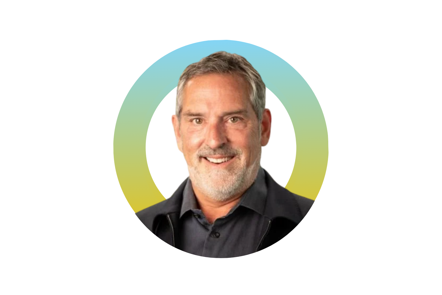 A smiling middle-aged man with gray hair and beard, wearing a black jacket and shirt, against a colorful abstract background.