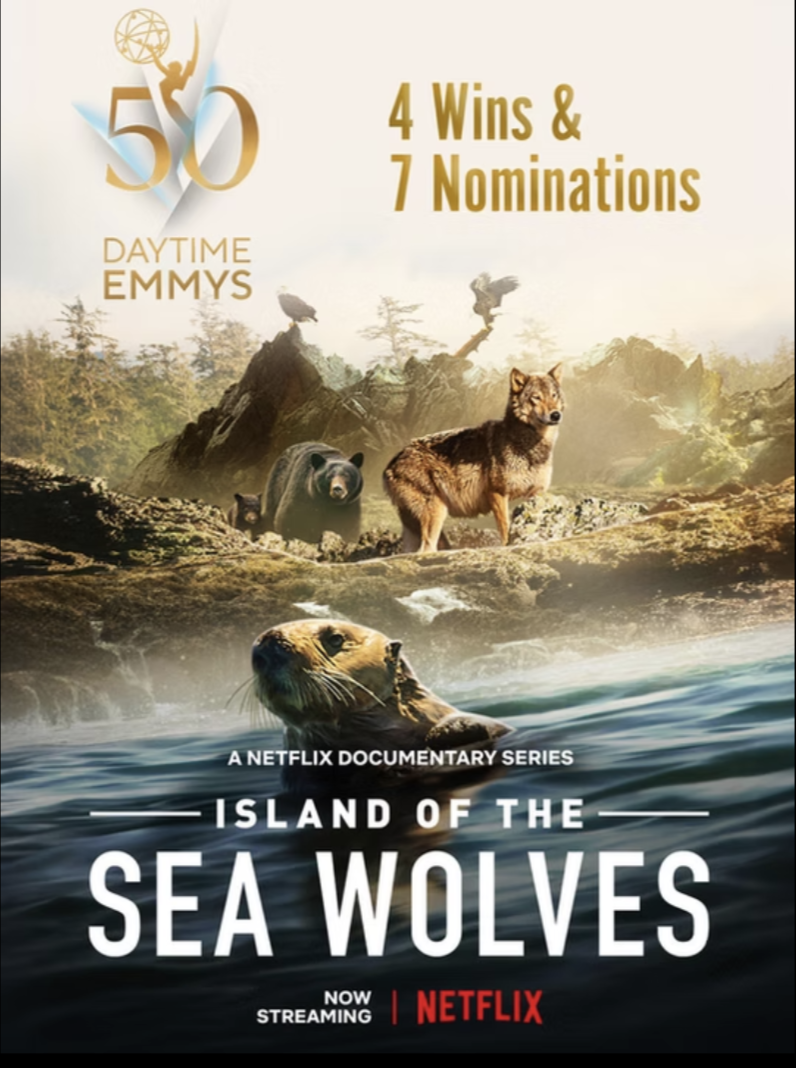 Promotional poster for the Netflix documentary series 'Island of the Sea Wolves,' celebrating 50 daytime Emmys with highlights of 4 wins and 7 nominations. Features wilderness scenes including sea wolves, bears, a wolf, and birds in a coastal landscape.