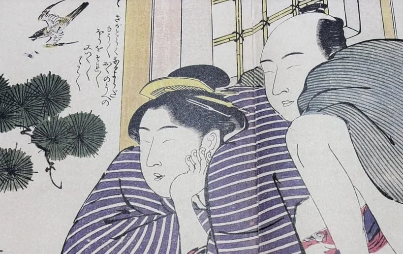 Two women in traditional Japanese clothing relaxing indoors, with one resting her head on her hand and the other leaning with her eyes closed, beside a scroll with nature imagery.