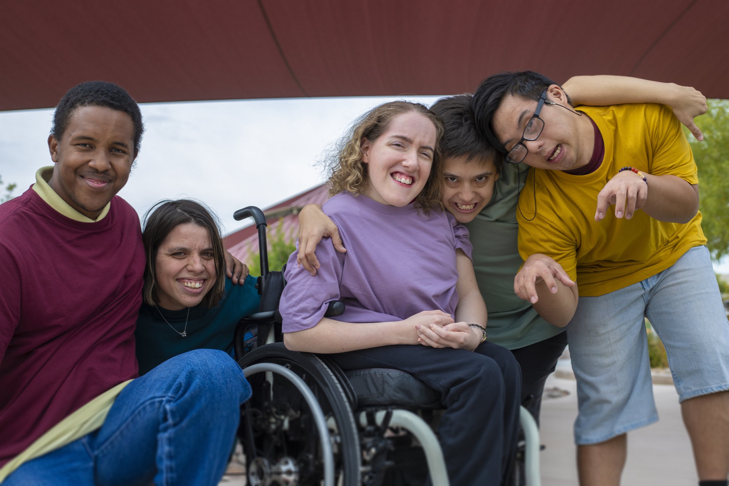 Group of friends with special needs enjoying time outdoors
