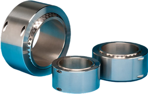 Three metallic ball bearings with blue outer rims on a black background.