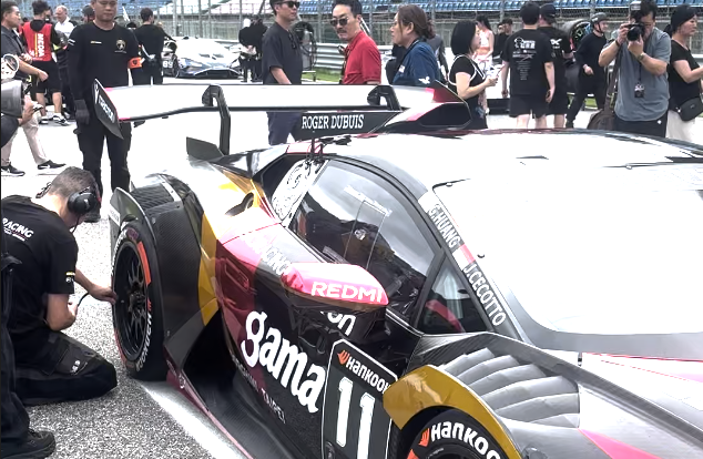 Watching the mechanics check the cars in real life!