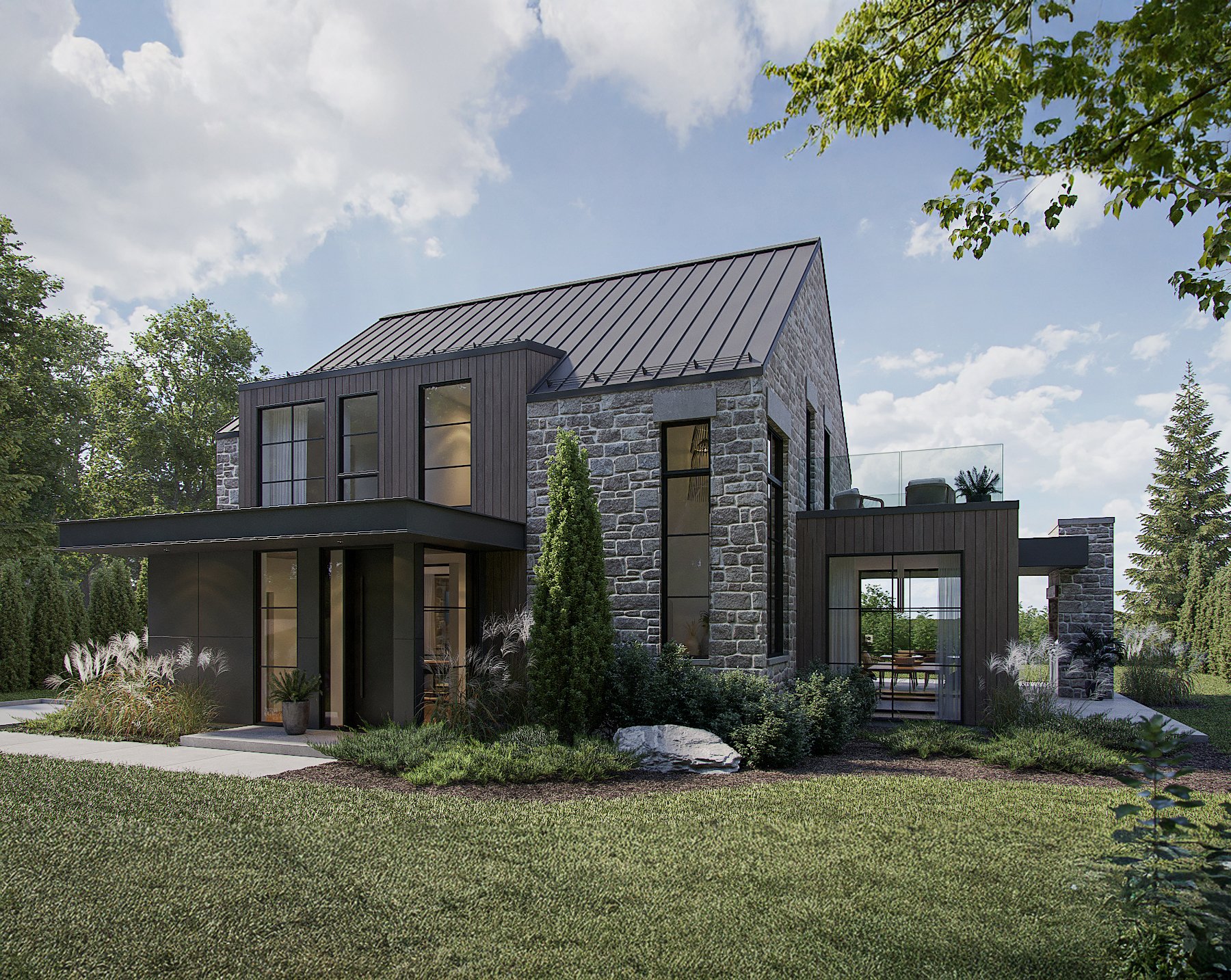 Maison moderne avec une façade en pierre et en bois, grandes fenêtres, balcon avec mobilier, entourée de verdure et d'un ciel partiellement nuageux.