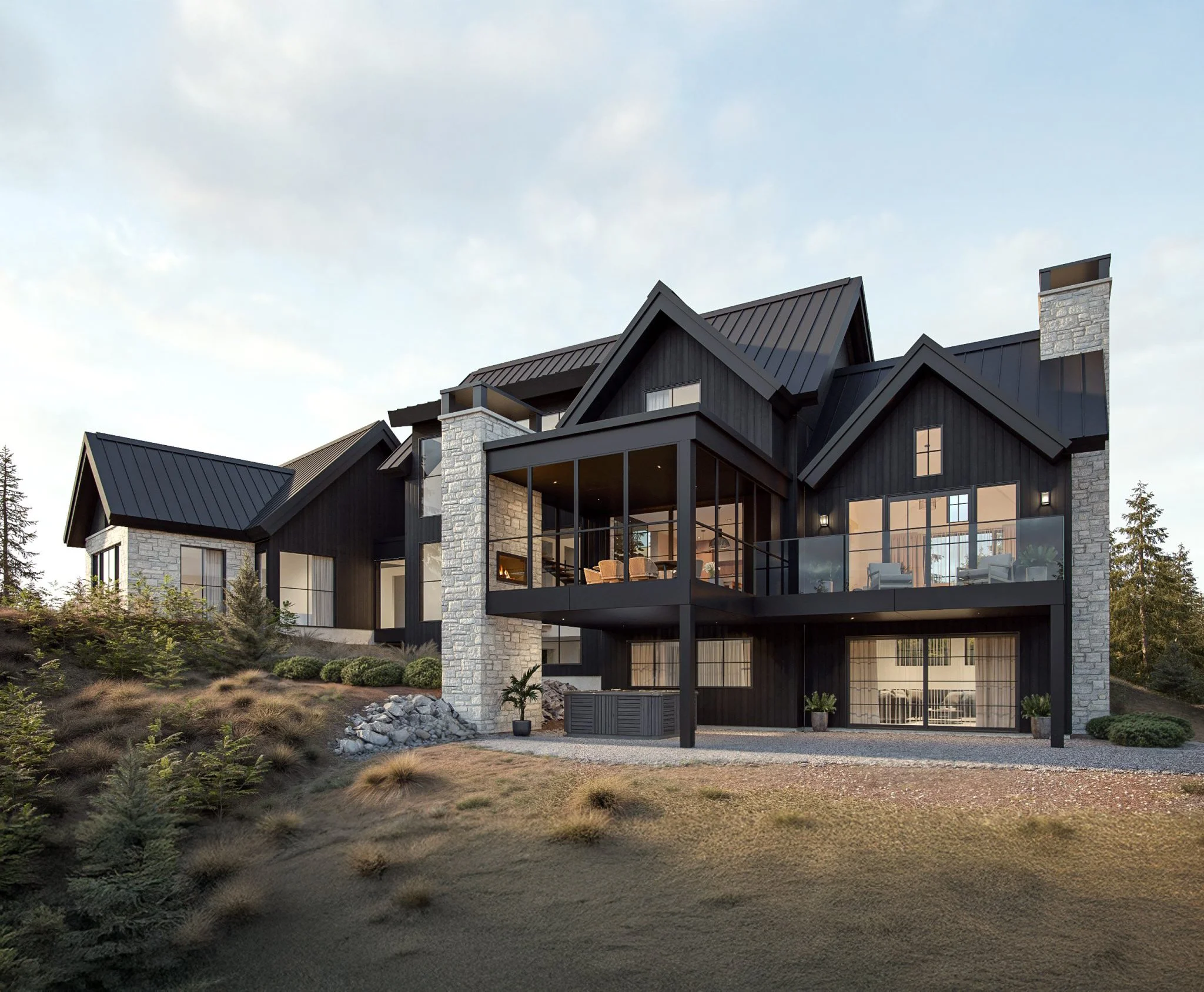 Maison moderne noire avec balcon en pierre naturelle et grandes fenêtres, entourée de végétation et de terrain en pente.