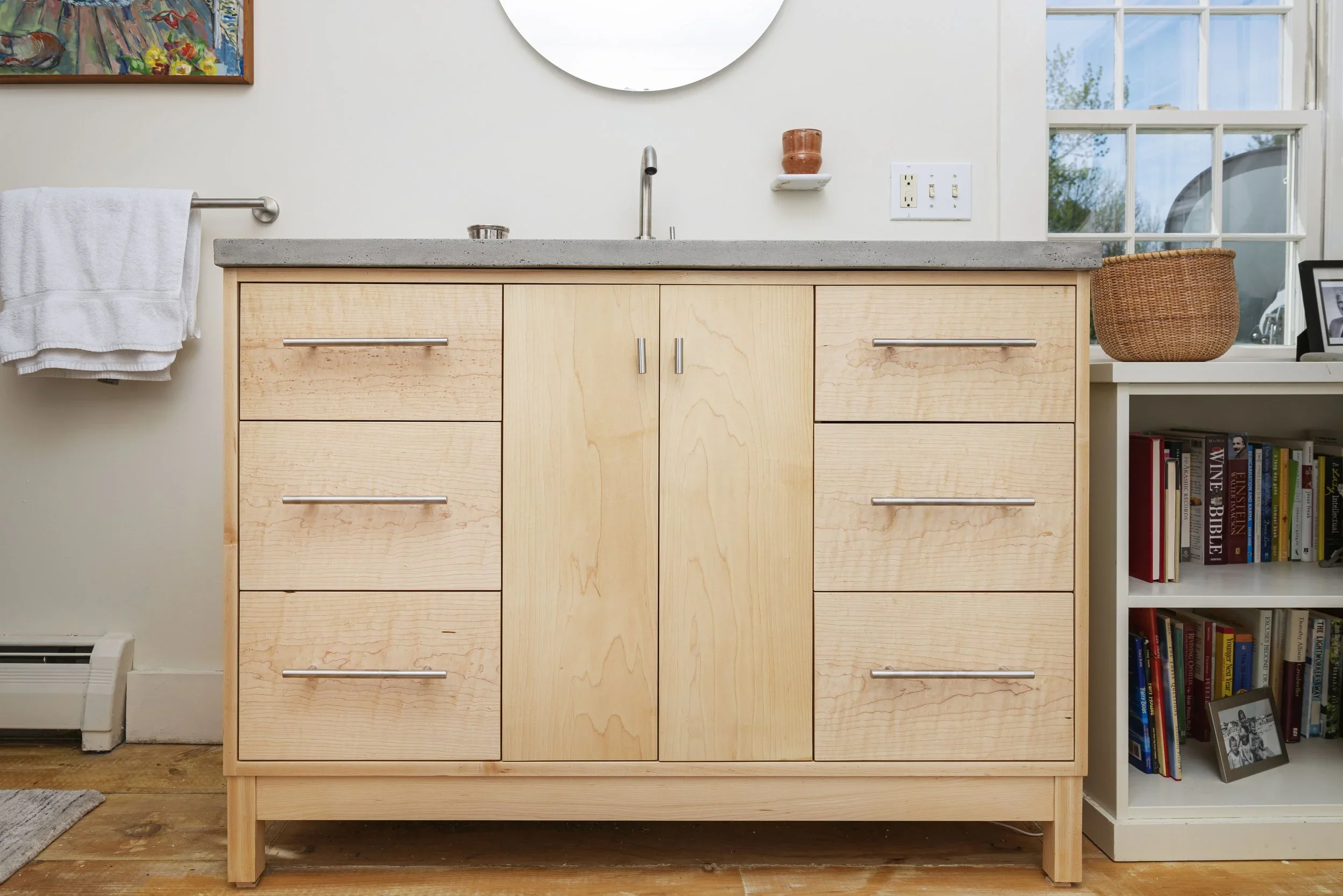Maple vanity with concrete counter top