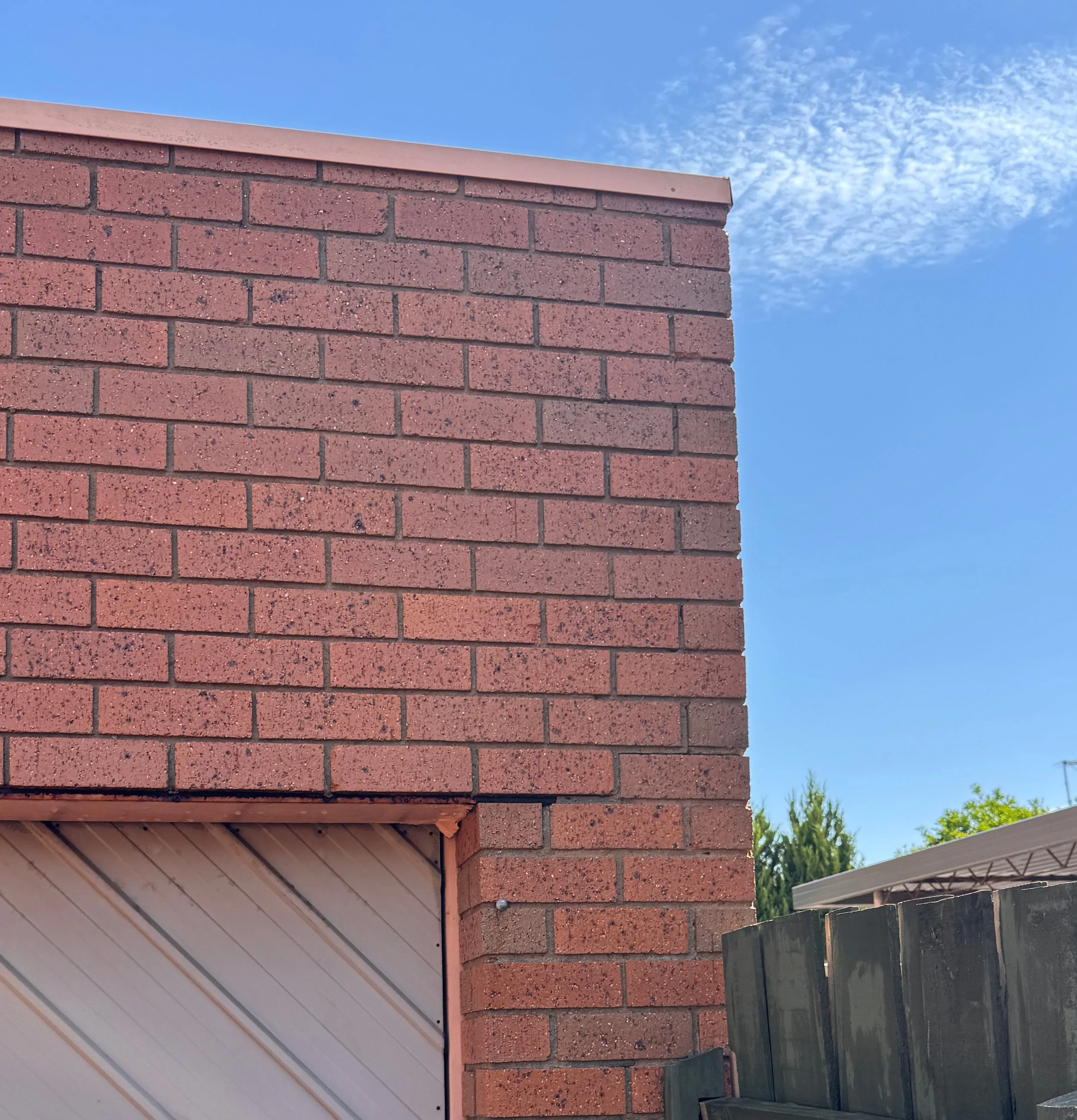 Close up of clean red brick wall in Melbourne after soft washing treatment.