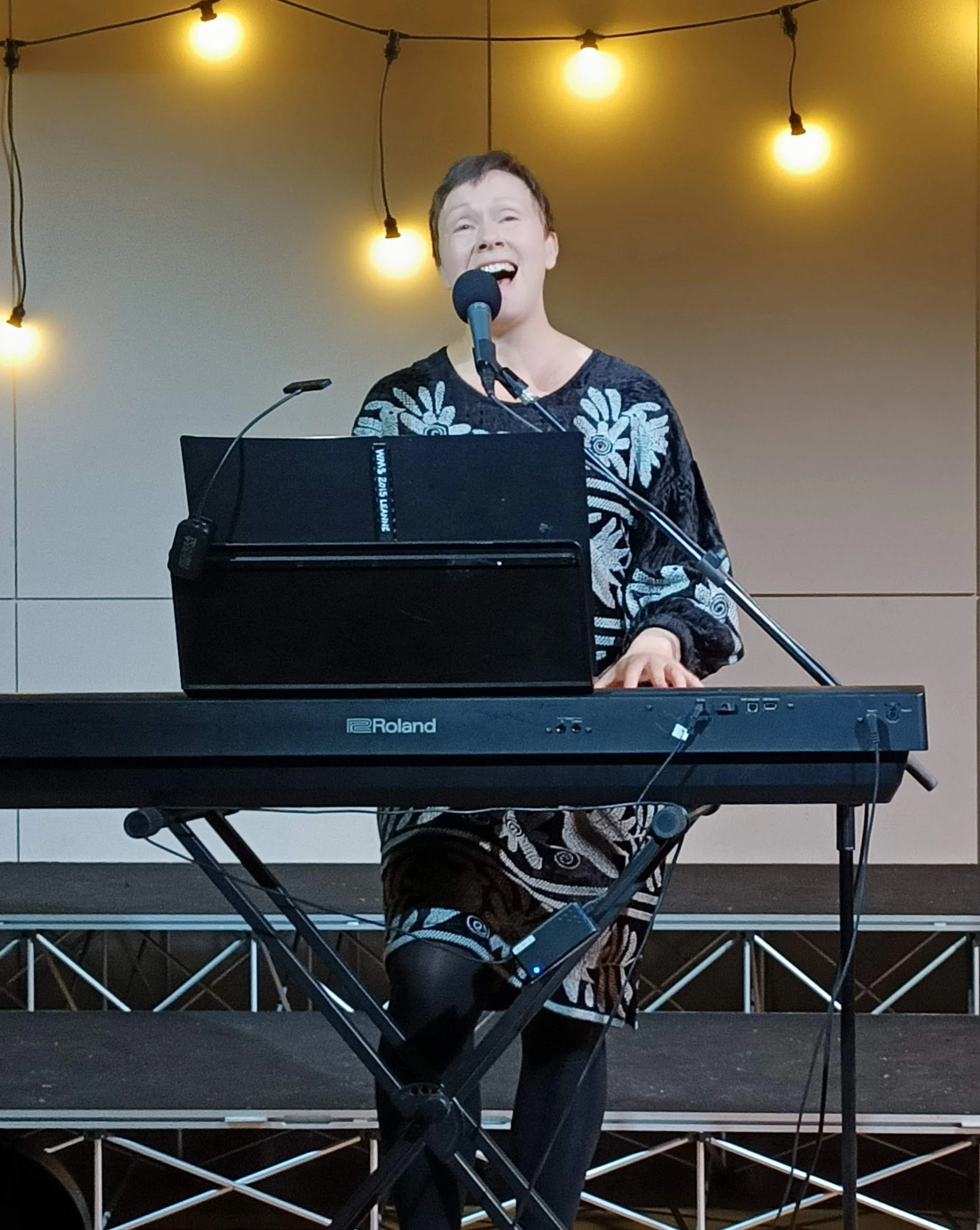 Leanne leading a singalong