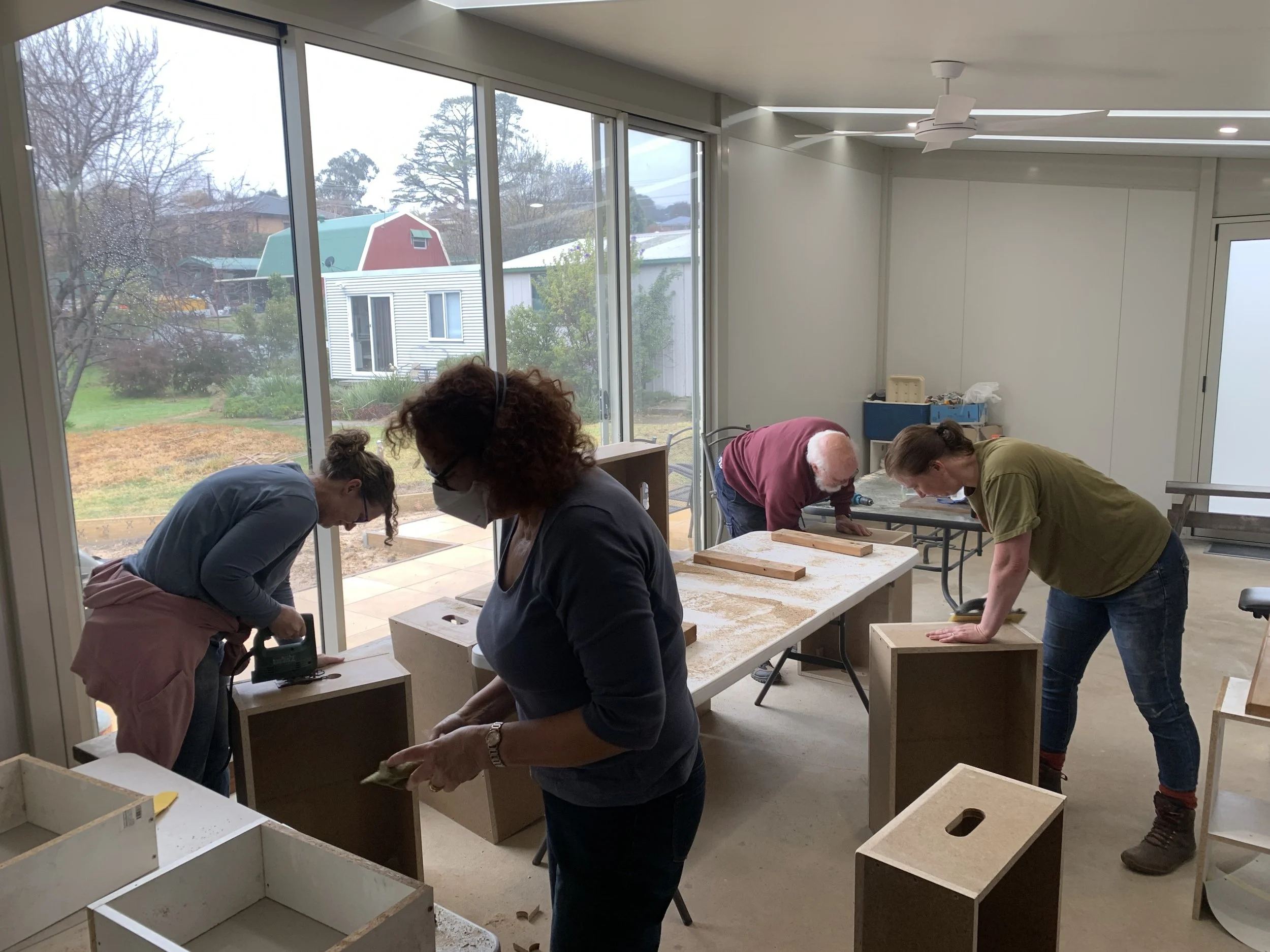 Making the mini stages... L to R Alli, Treena, John & Anna