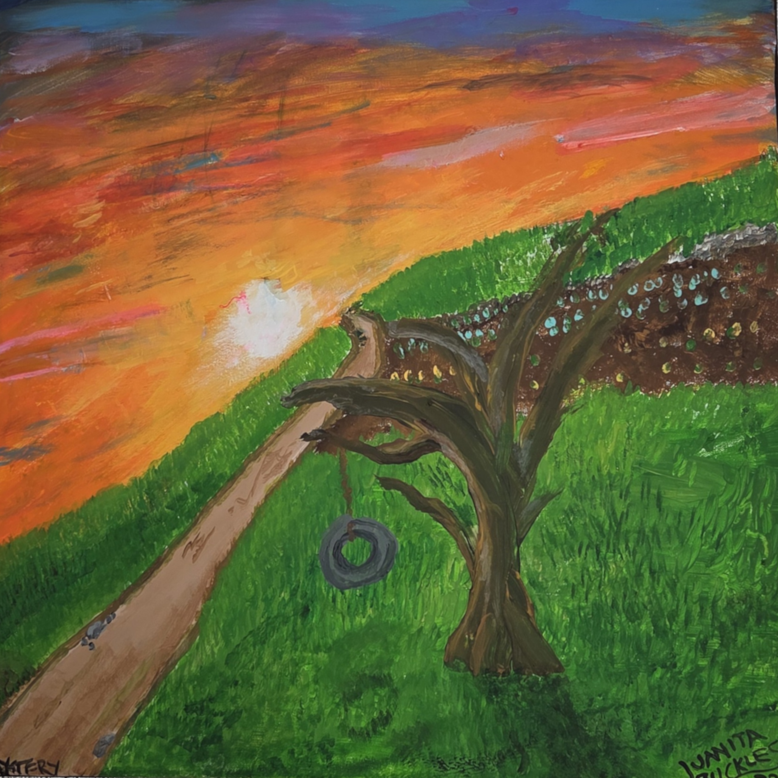 A sunset over a grassy hill with a dirt path. A large, leafless tree with a tire swing hanging from one branch is in the foreground. The sky is filled with orange, pink, purple, and blue colors.