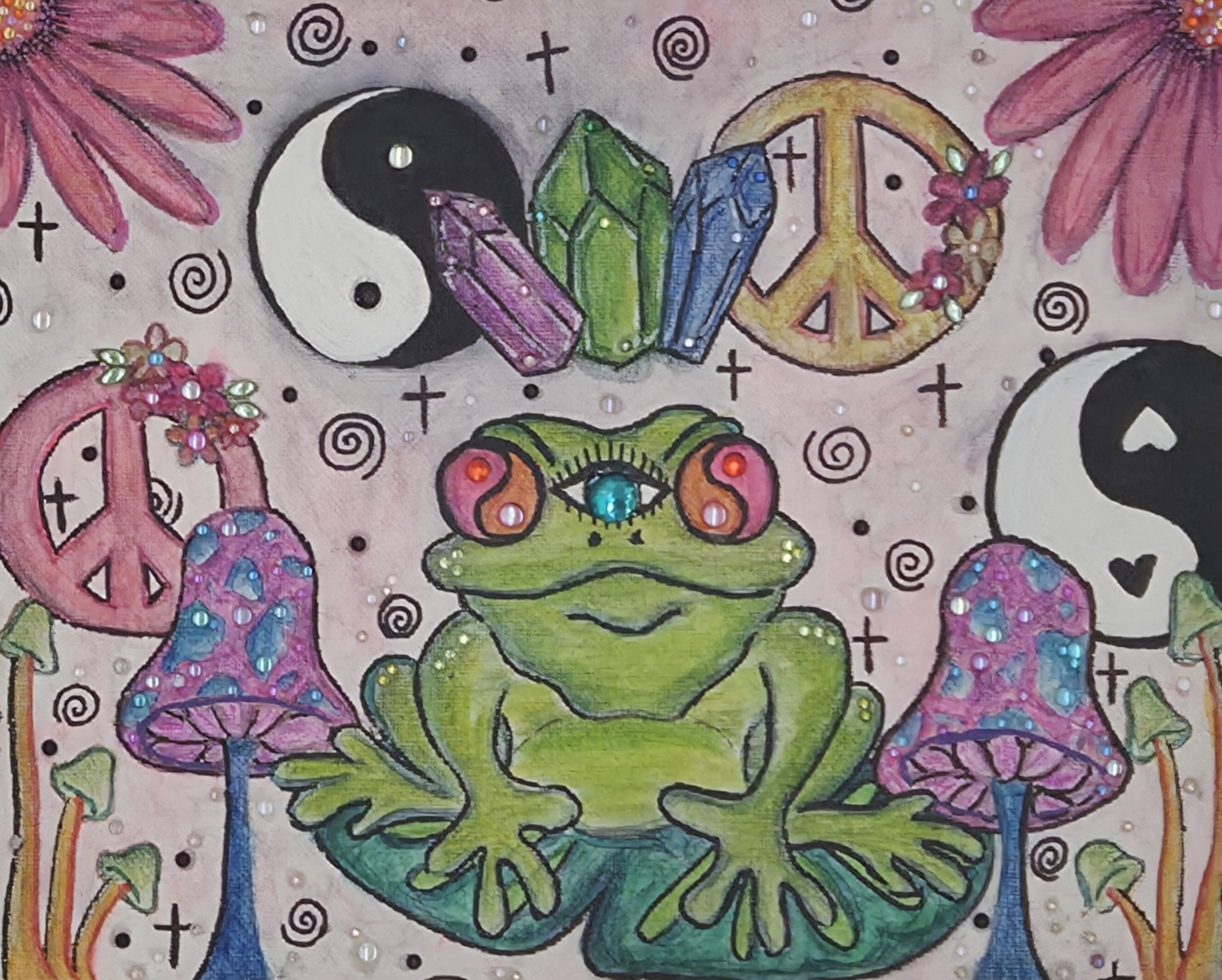 Colorful drawing featuring a green frog with a gemstone on its forehead, surrounded by pink and purple mushrooms, peace signs, yin-yang symbols, gemstones, and small decorative elements on a light pink background.