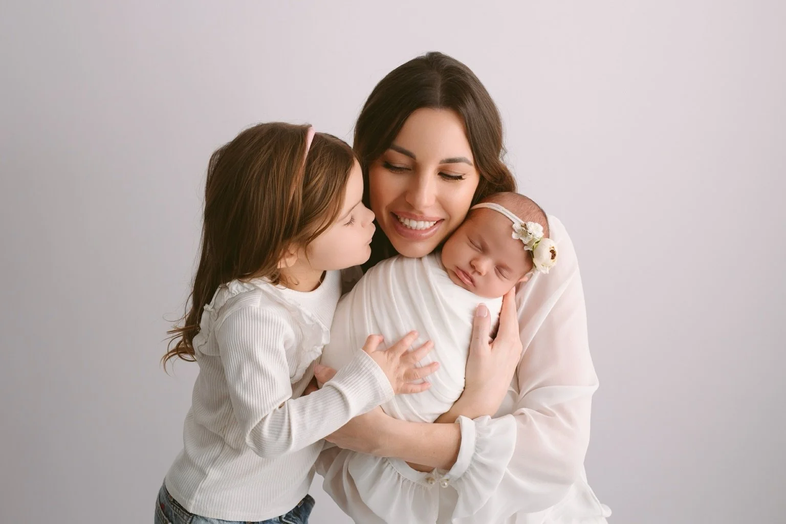 Simple.
Elegant.
Timeless.

Our newborn sessions are designed to keep the focus exactly where it belongs&mdash;on the love between your family.

Soft neutral tones, natural posing, and genuine connection create photographs that will never go out of s