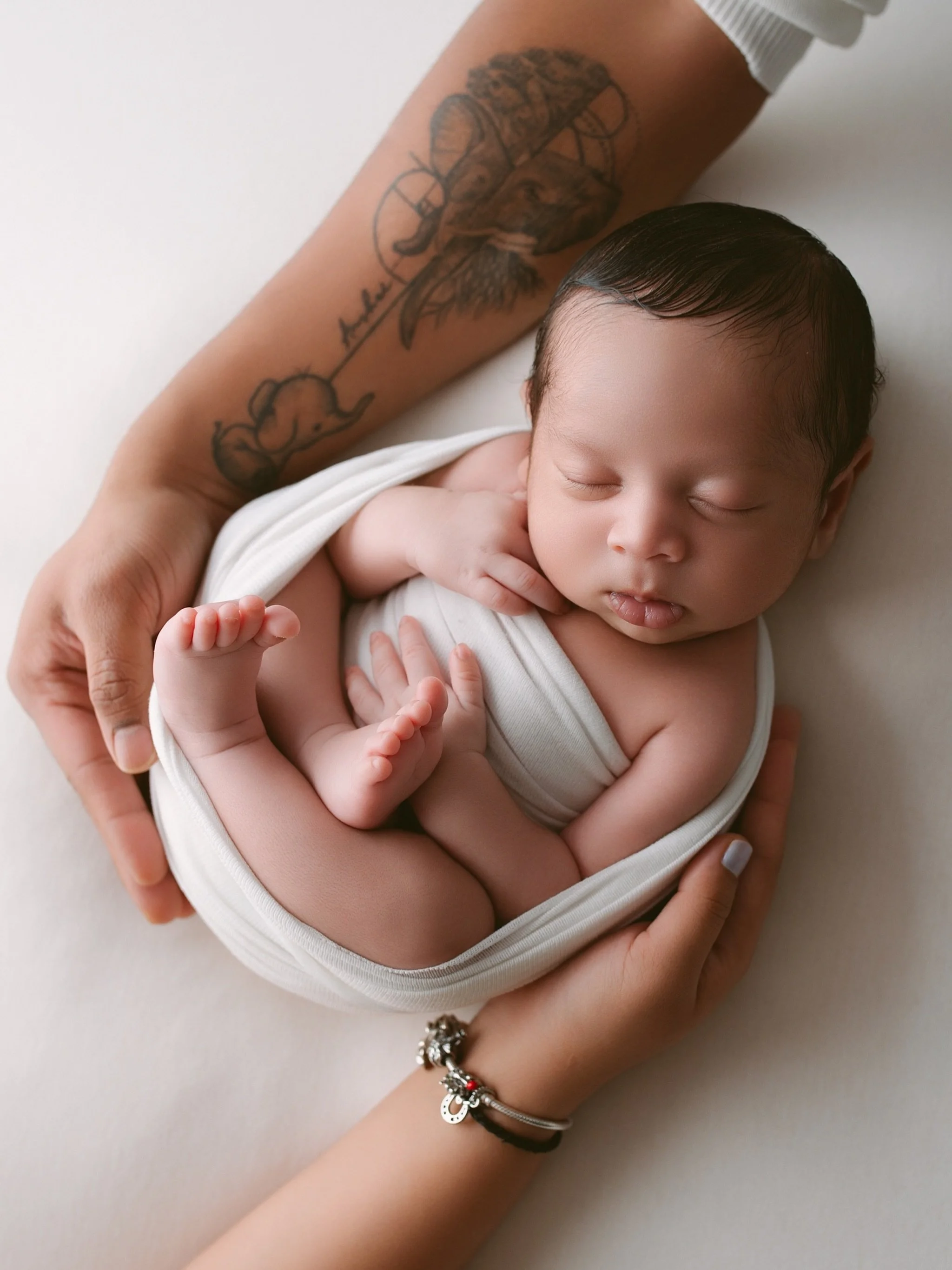 The greatest love I've ever known, wrapped up and sleeping in my hands.

#NewbornPhotography  #newbornboy #annaclairestudio #instanewborn