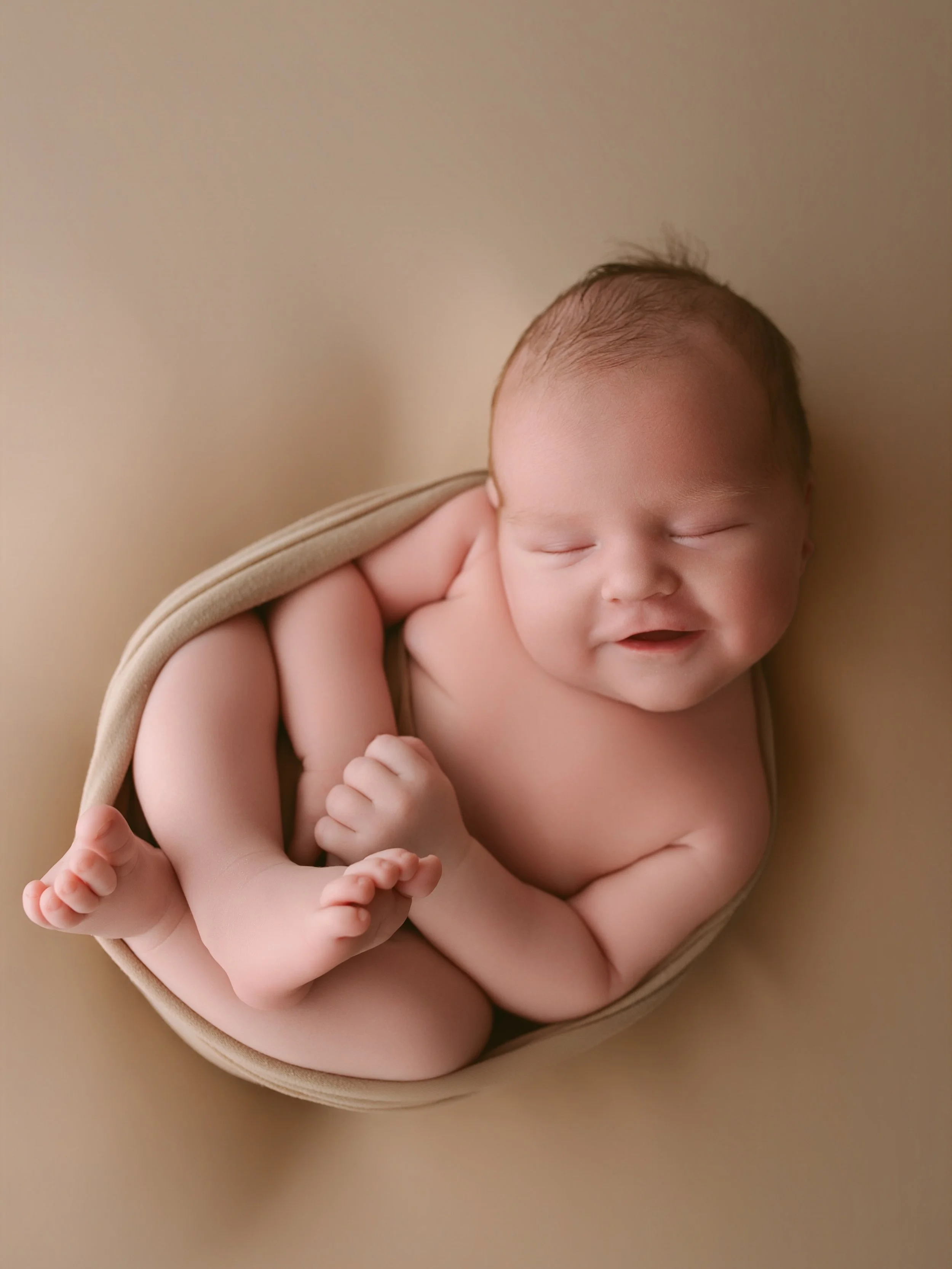 Tiny smile, endless love. 

Some smiles don't need words&mdash;they simply melt your heart. Welcome to the world, little one. May your days always be filled with love, warmth, and beautiful moments like this. ✨

#NewbornPhotography #BabyBoy #NewbornS