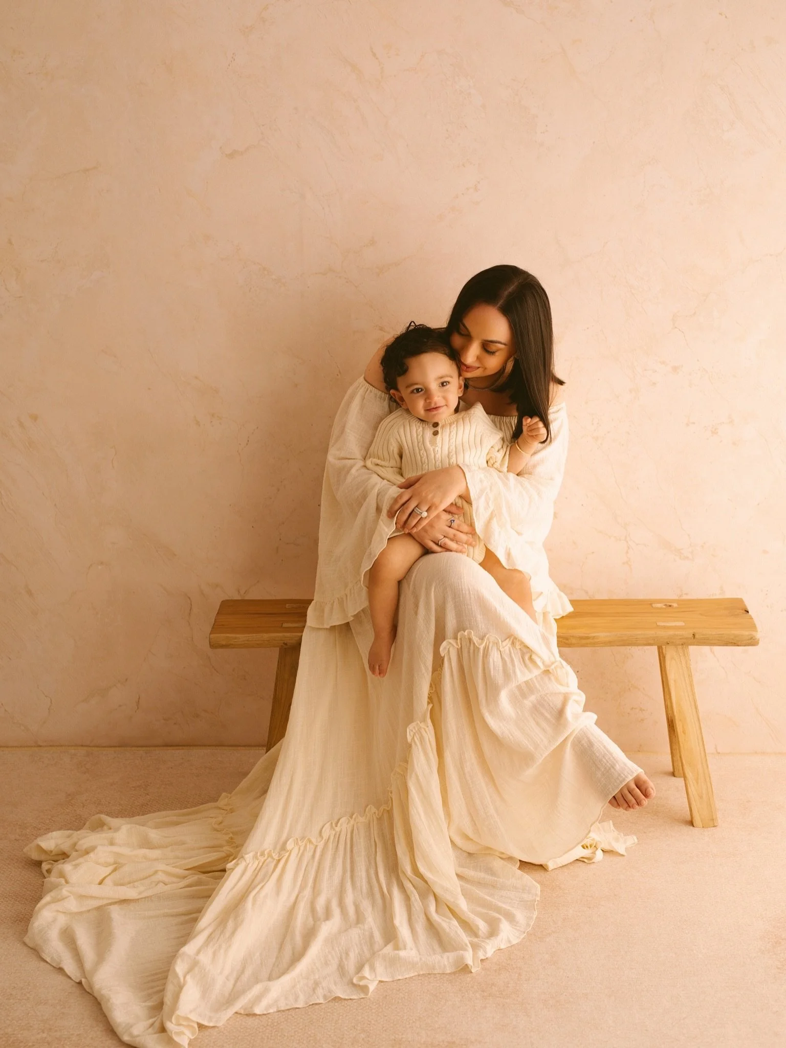 A beautiful mum with her golden boy 🤍

Wrapped in warm light, love, and the sweetest little moments together.
@katebackdrops @yewendress 
#MumAndBaby  #BabyPhotography #SydneyFamilyPhotographer AnnaClaireStudio