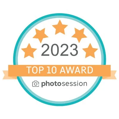 2023 TOP 10 Award badge with five orange stars and orange banner.