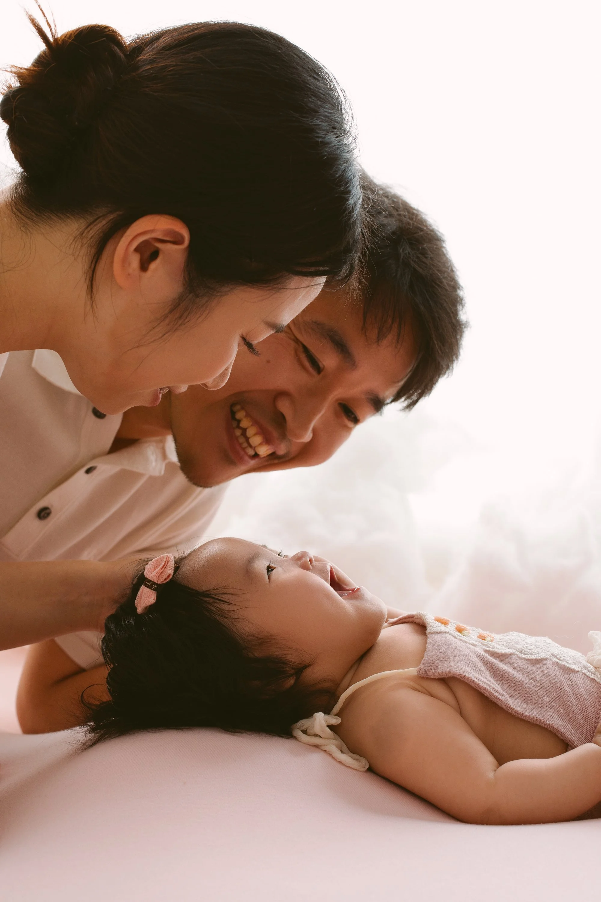 Family photos with high key background  