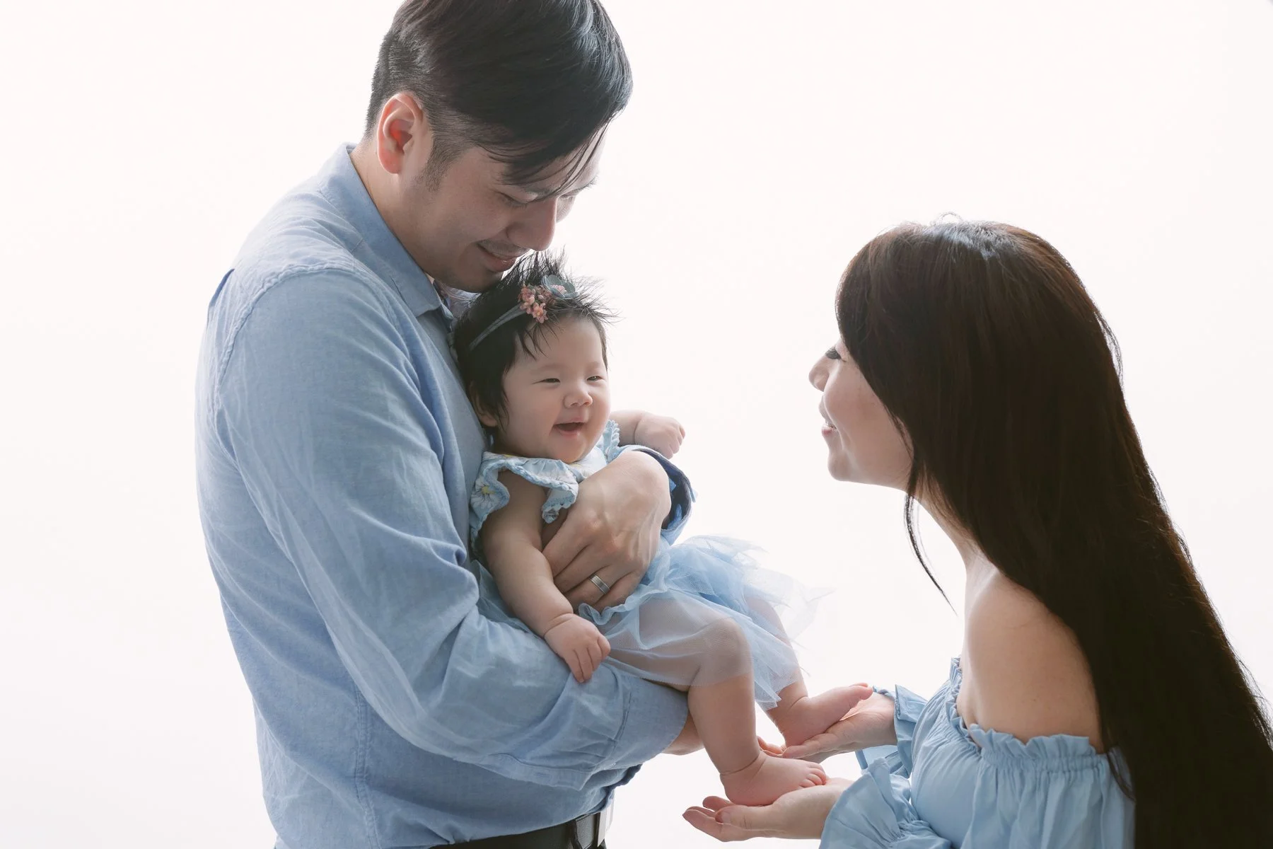 Family photos with high key background 