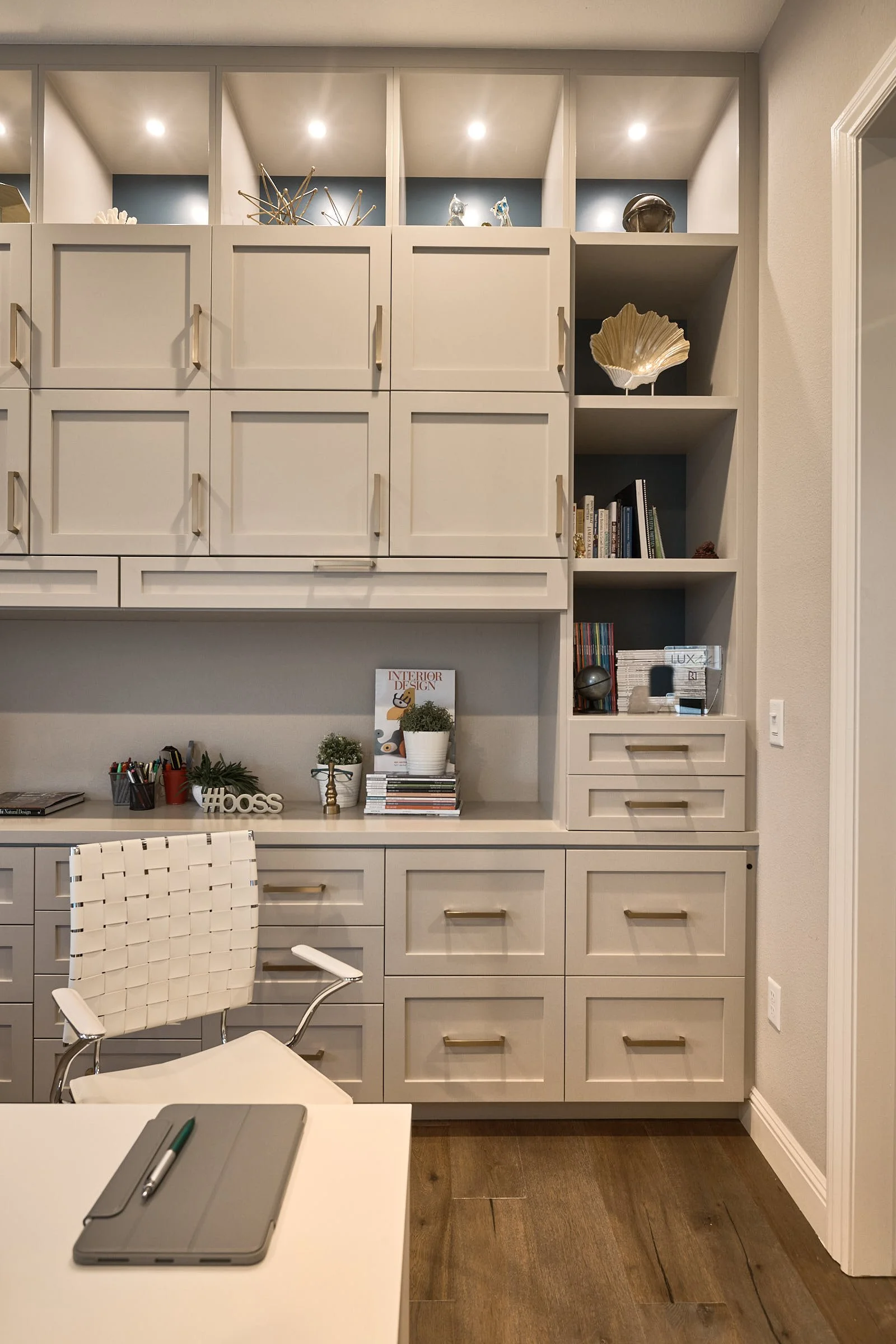 raashi-design-pleasanton-ca-home-office-design-white-desk-in-front-of-built-in-cabinets-and-shelves-for-storage-contemporary.jpg