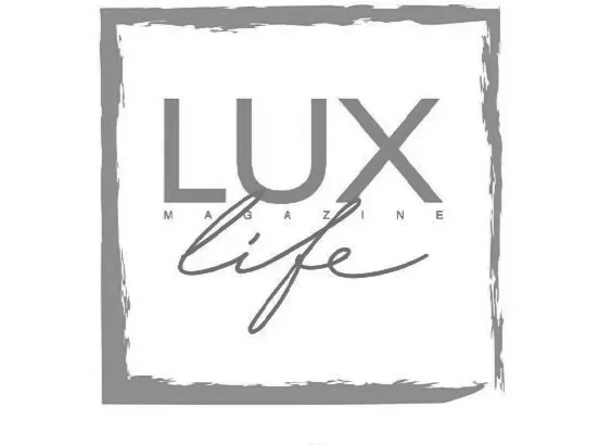 Logo for Lux Life Magazine with a gray border and text in black and gray that reads 'LUX LIFE MAGAZINE'
