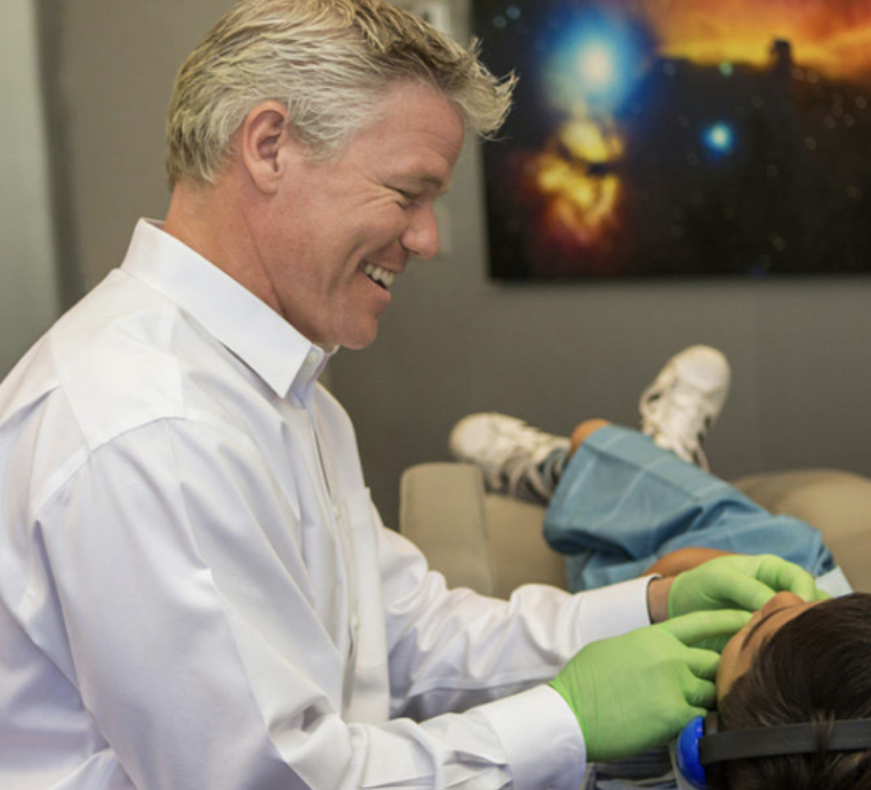 Dr Eric Dixon Examines Pediatric Dental Patient