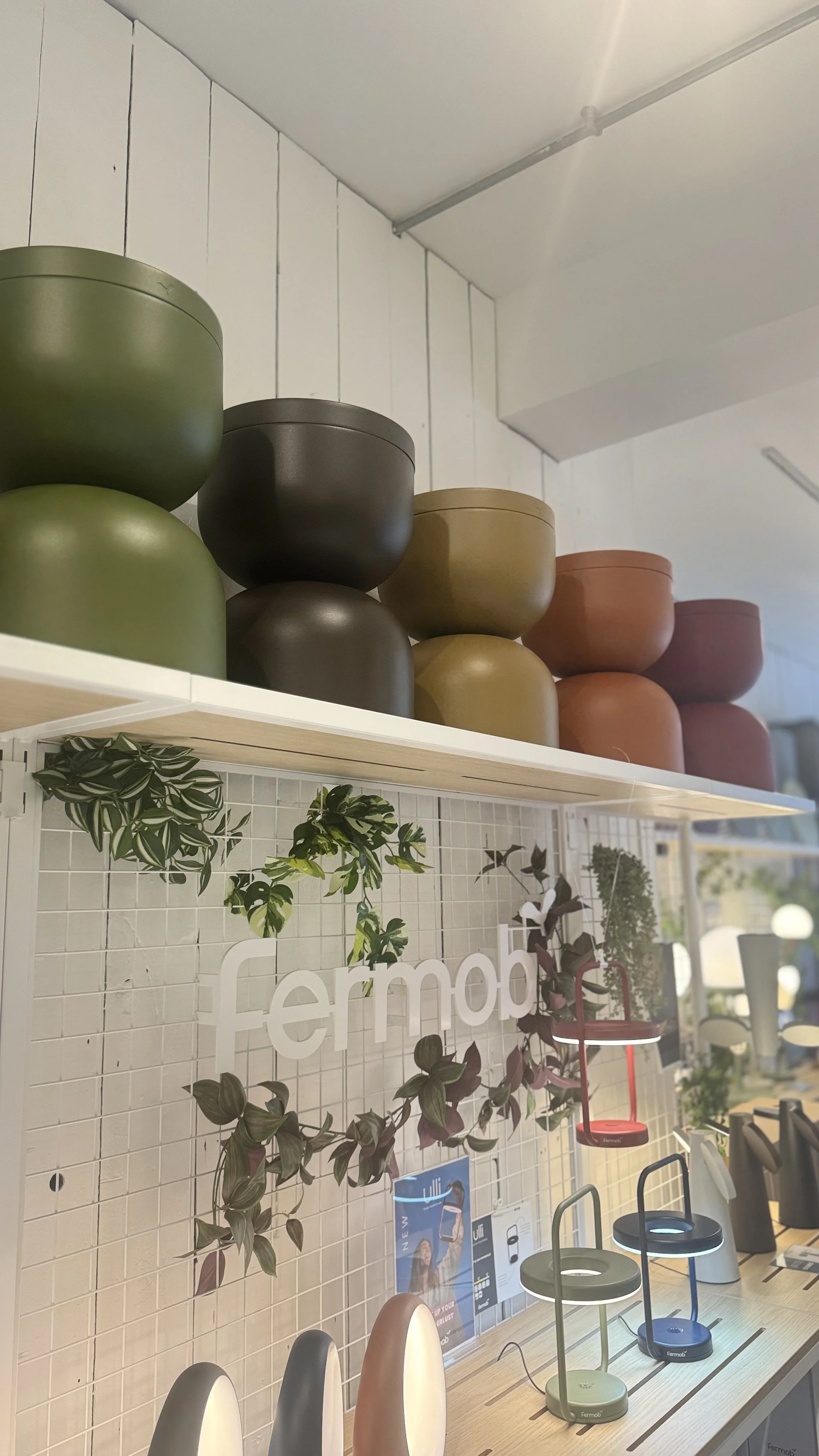 shop display of colourful lighting and furniture