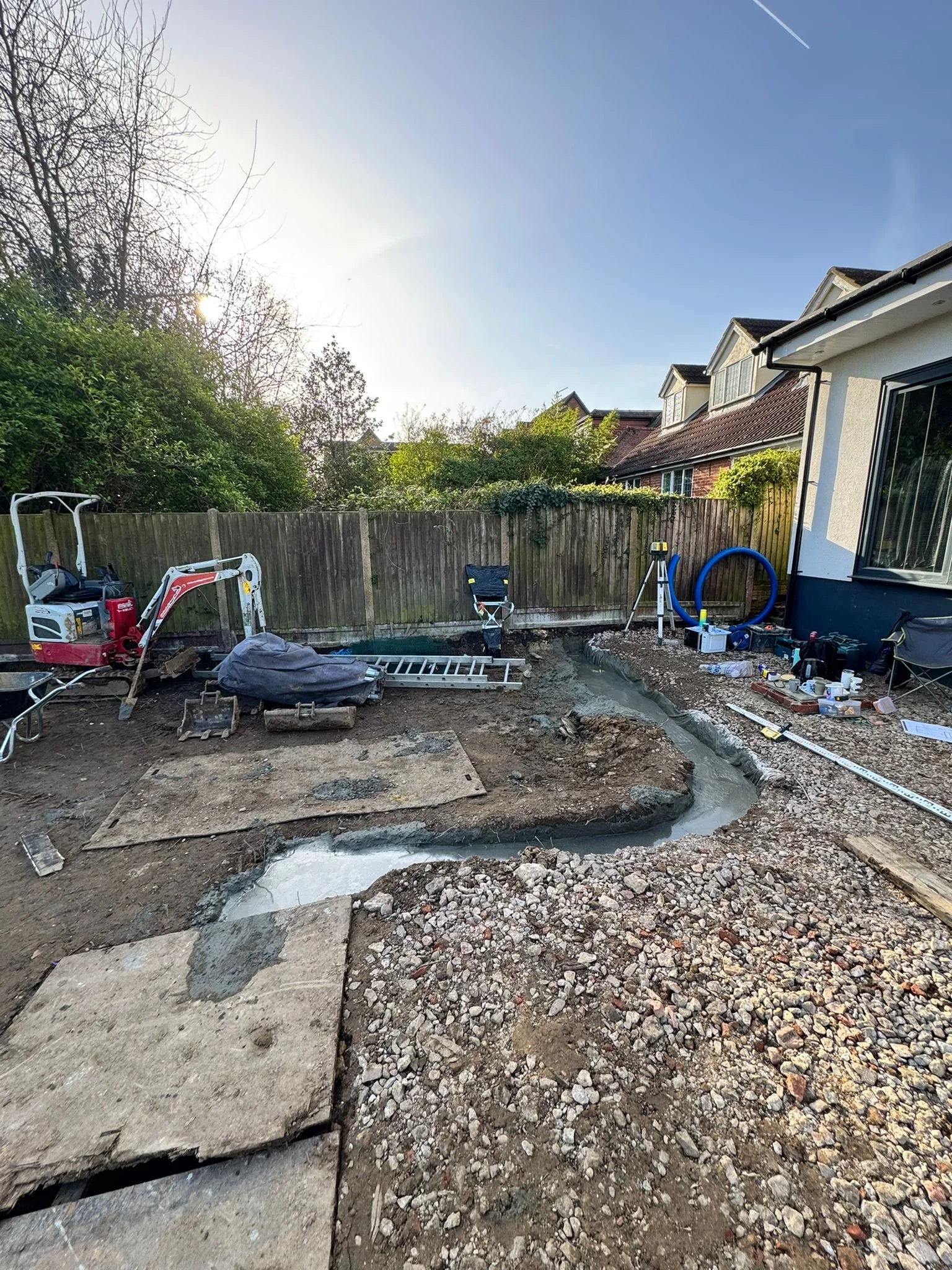 Concrete footings being poured