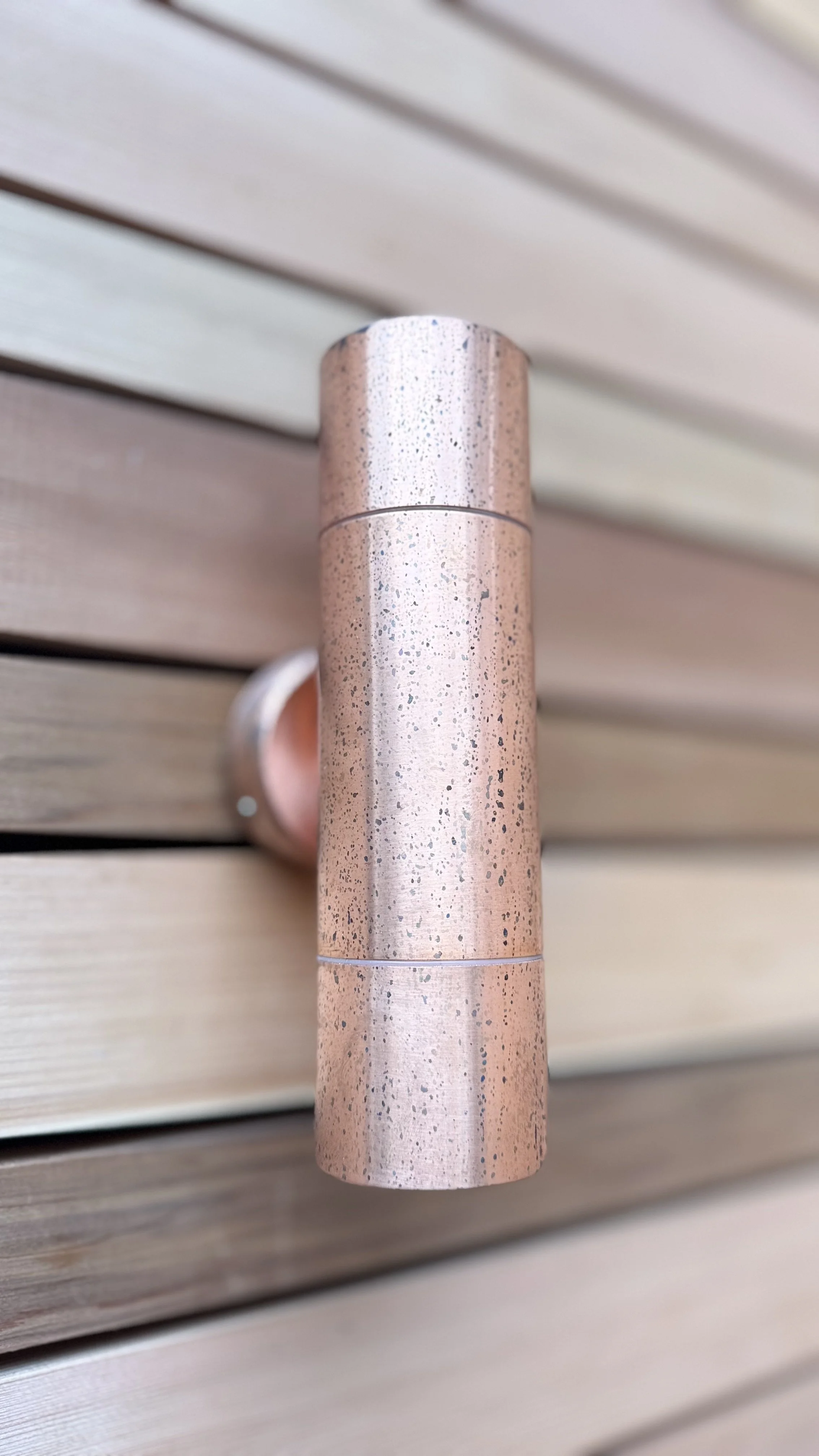 copper lighting on Cedar fence 