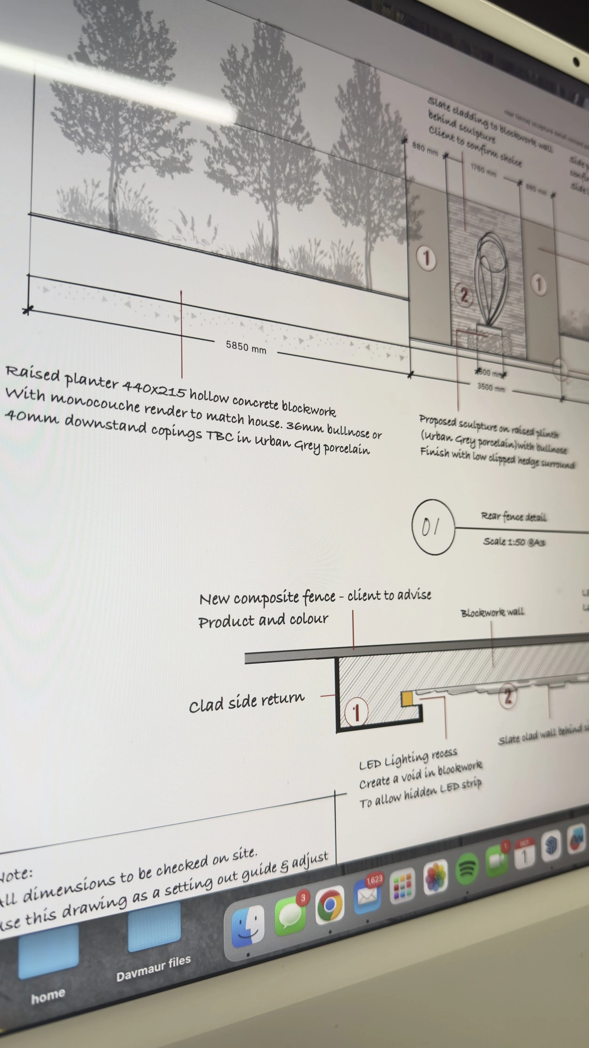 Architectural drawing of a landscape design with trees, a sculpture on a raised platform, a concrete blockwork wall, a new composite fence, and LED lighting details.