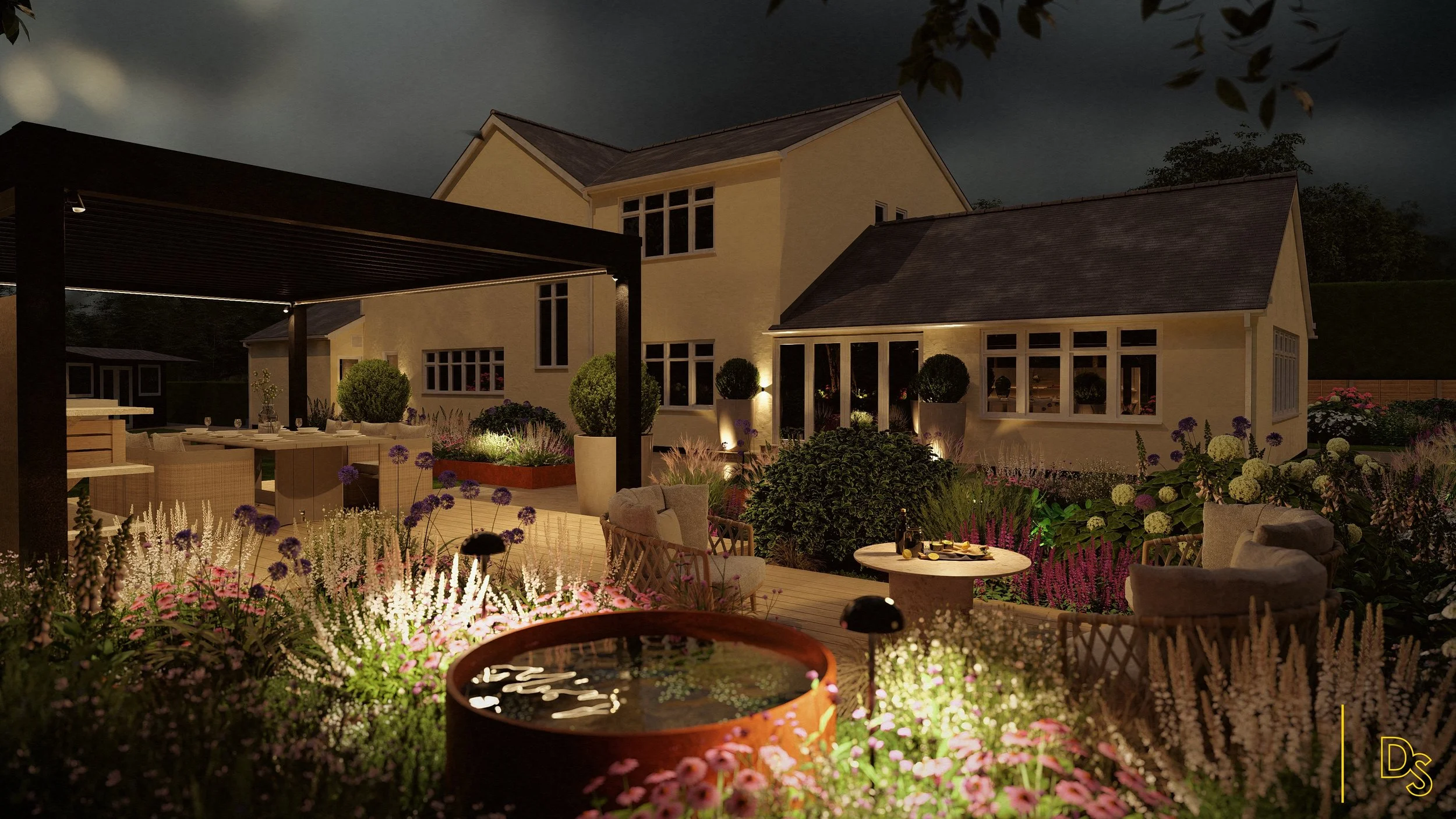 Nighttime view of a well-lit backyard with a modern house, patio furniture, surrounding garden with colorful flowers, potted plants, and a hot tub in the foreground.